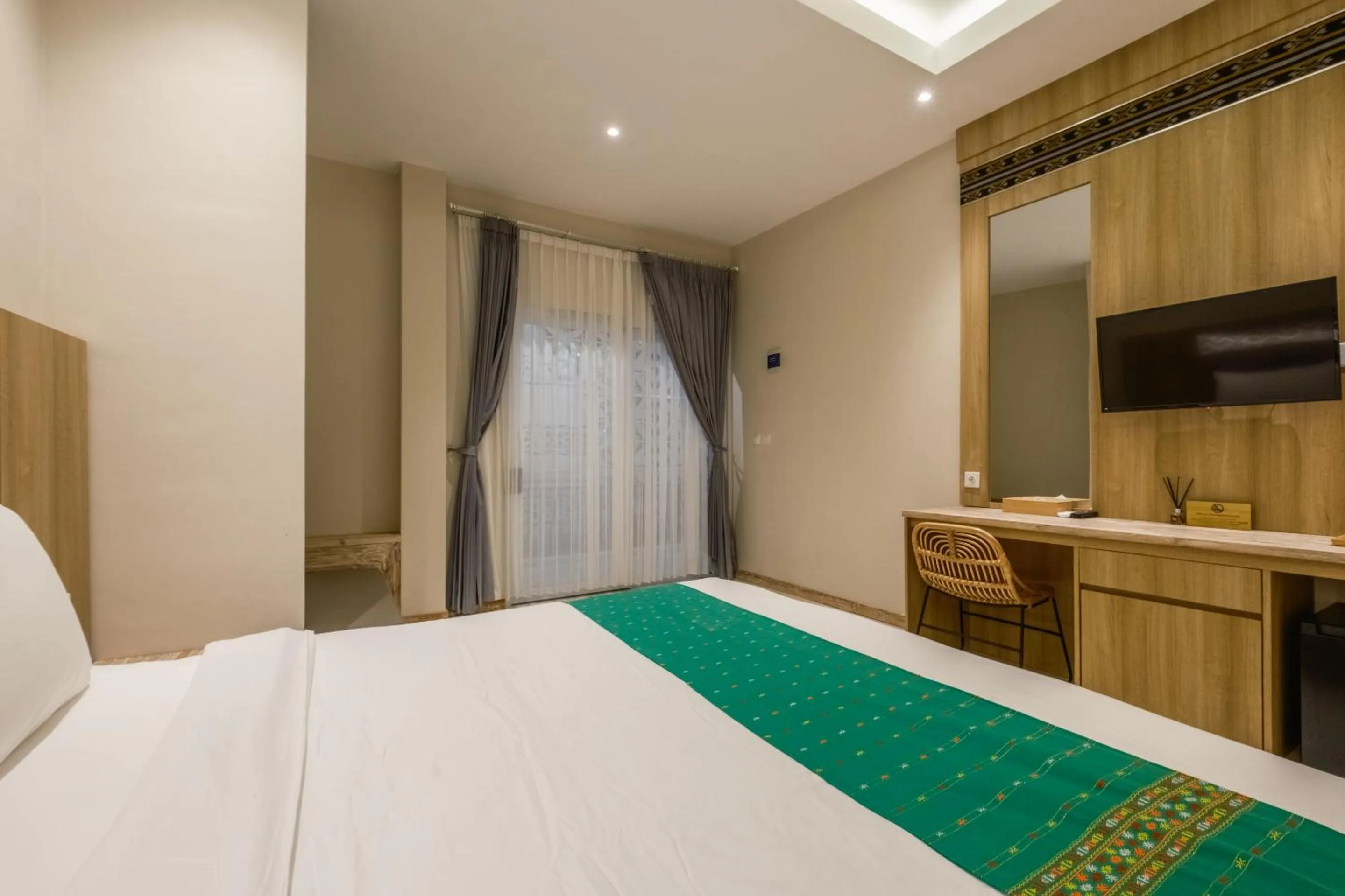 Bed in DEJAVU 2.0 HOTEL BAJO KOMODO