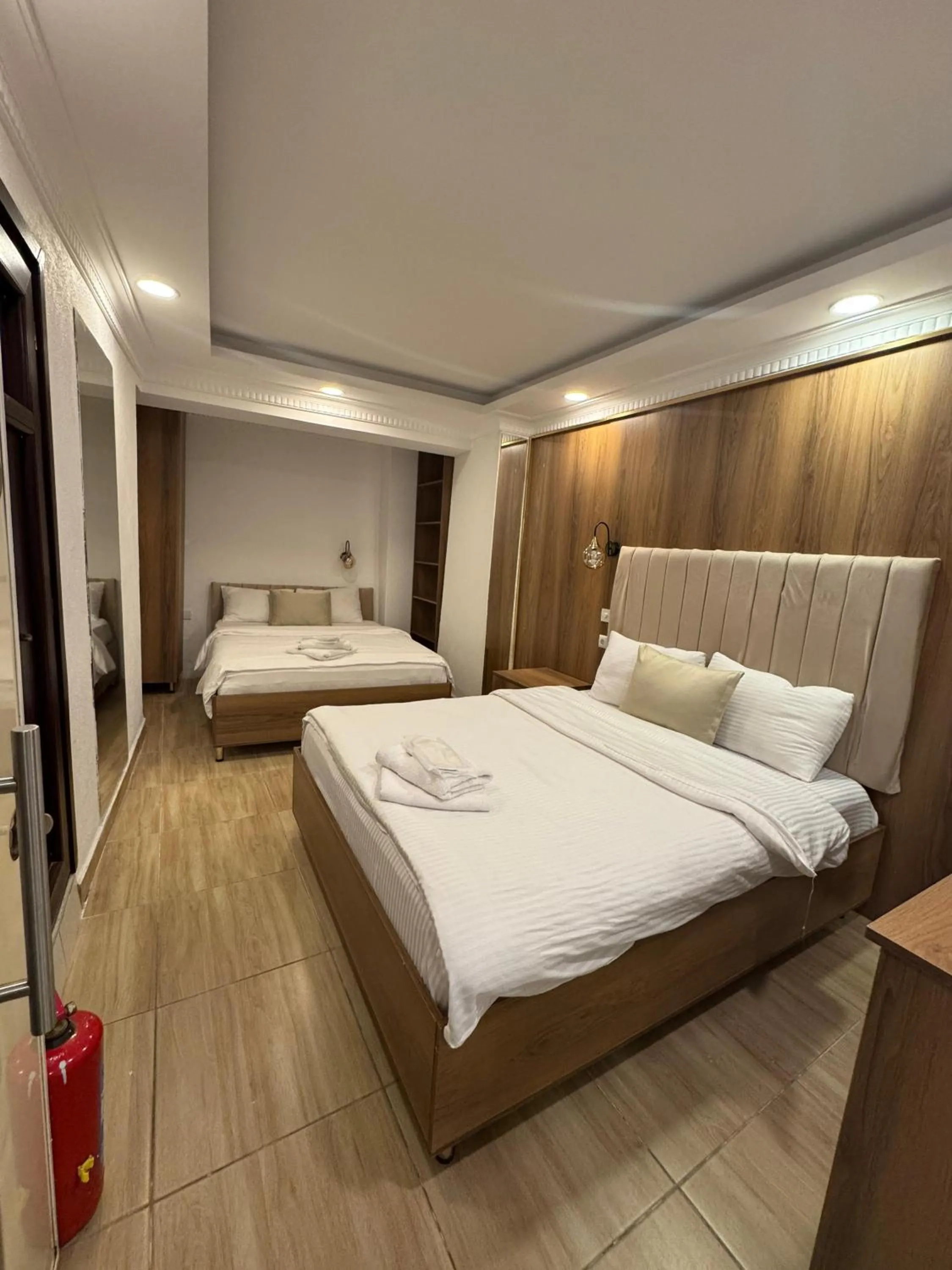 Living room, Bed in IMMORTELLE HOTEL