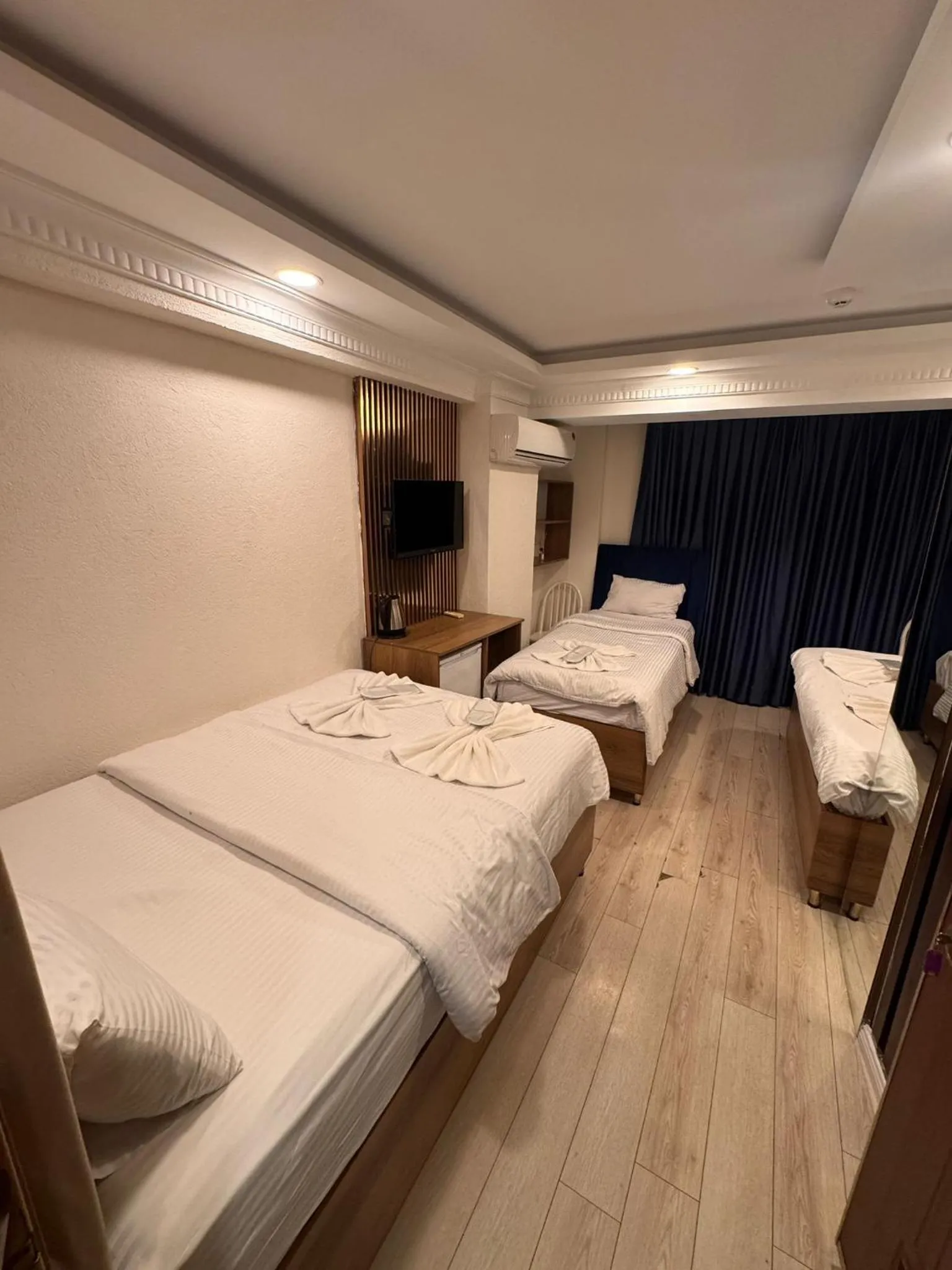 Bed in IMMORTELLE HOTEL