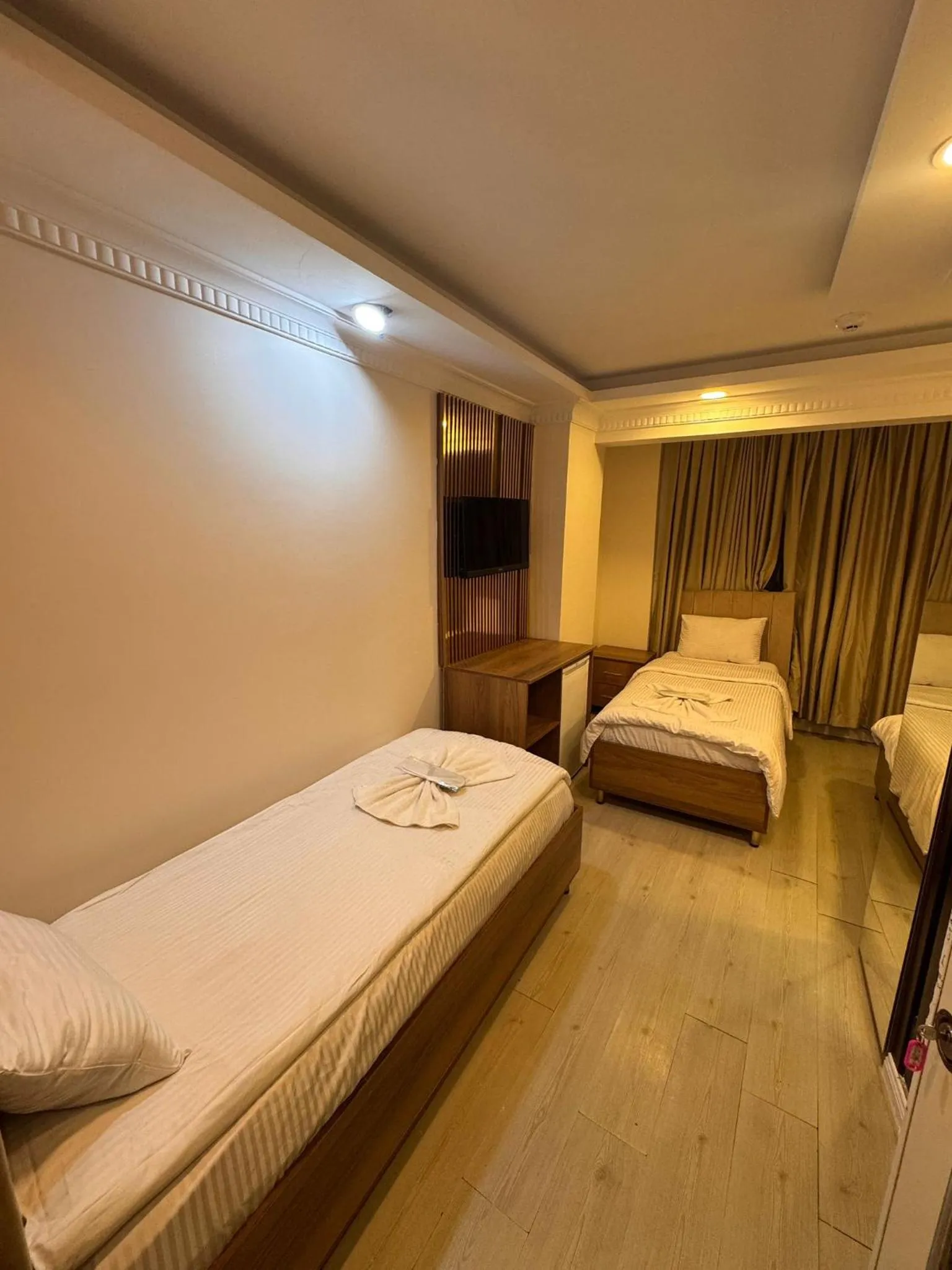 Bed in IMMORTELLE HOTEL