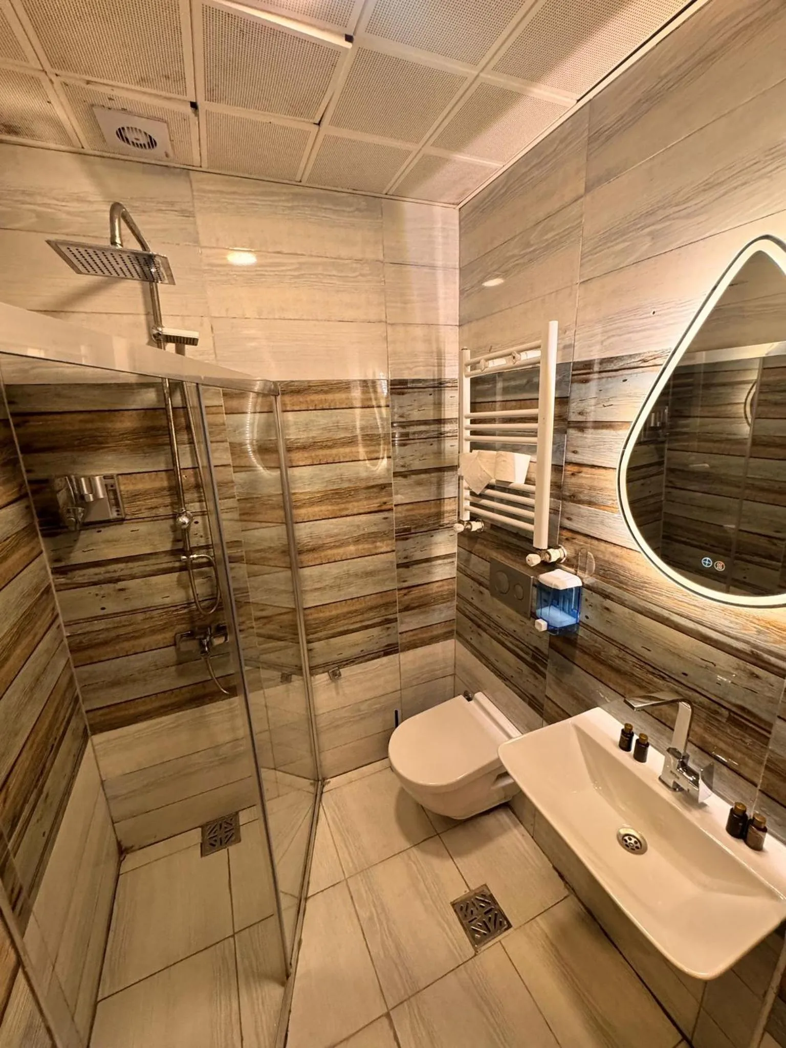 Shower in IMMORTELLE HOTEL