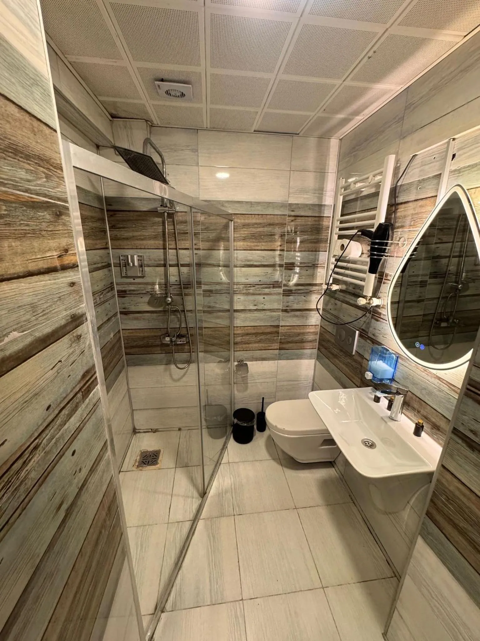 Shower in IMMORTELLE HOTEL