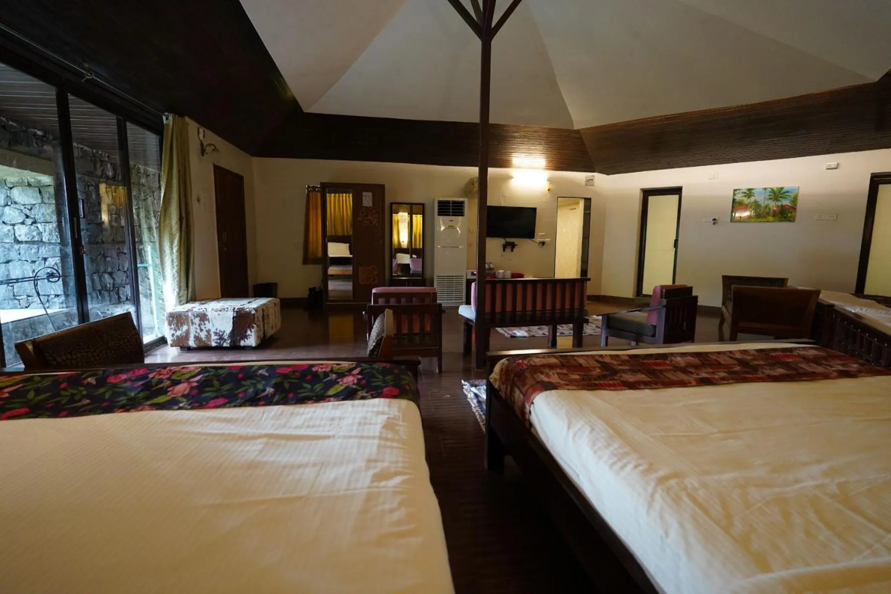 Photo of the whole room, Bed in Malhar Machi Mountain Resorts