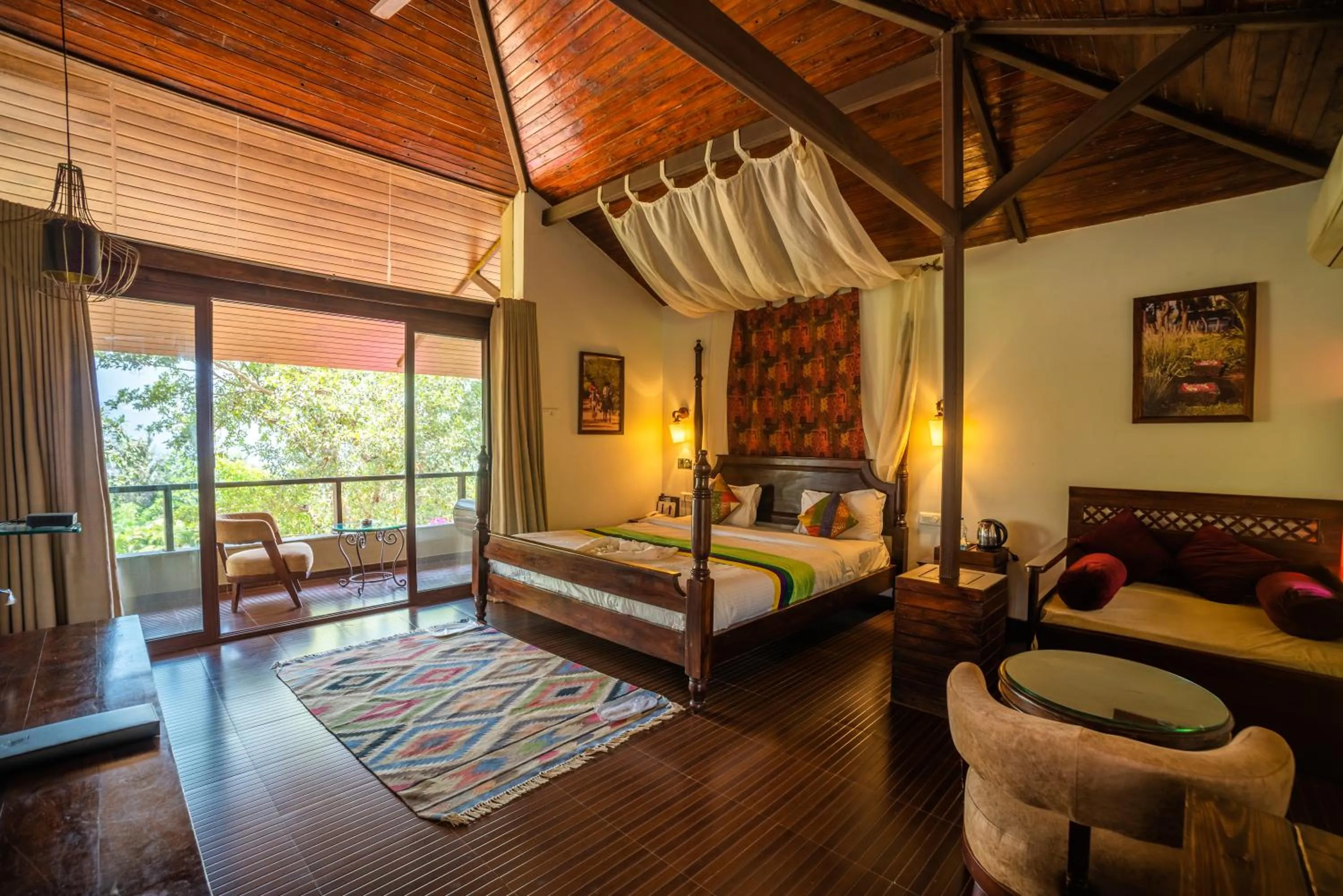 Photo of the whole room, Bed in Malhar Machi Mountain Resorts