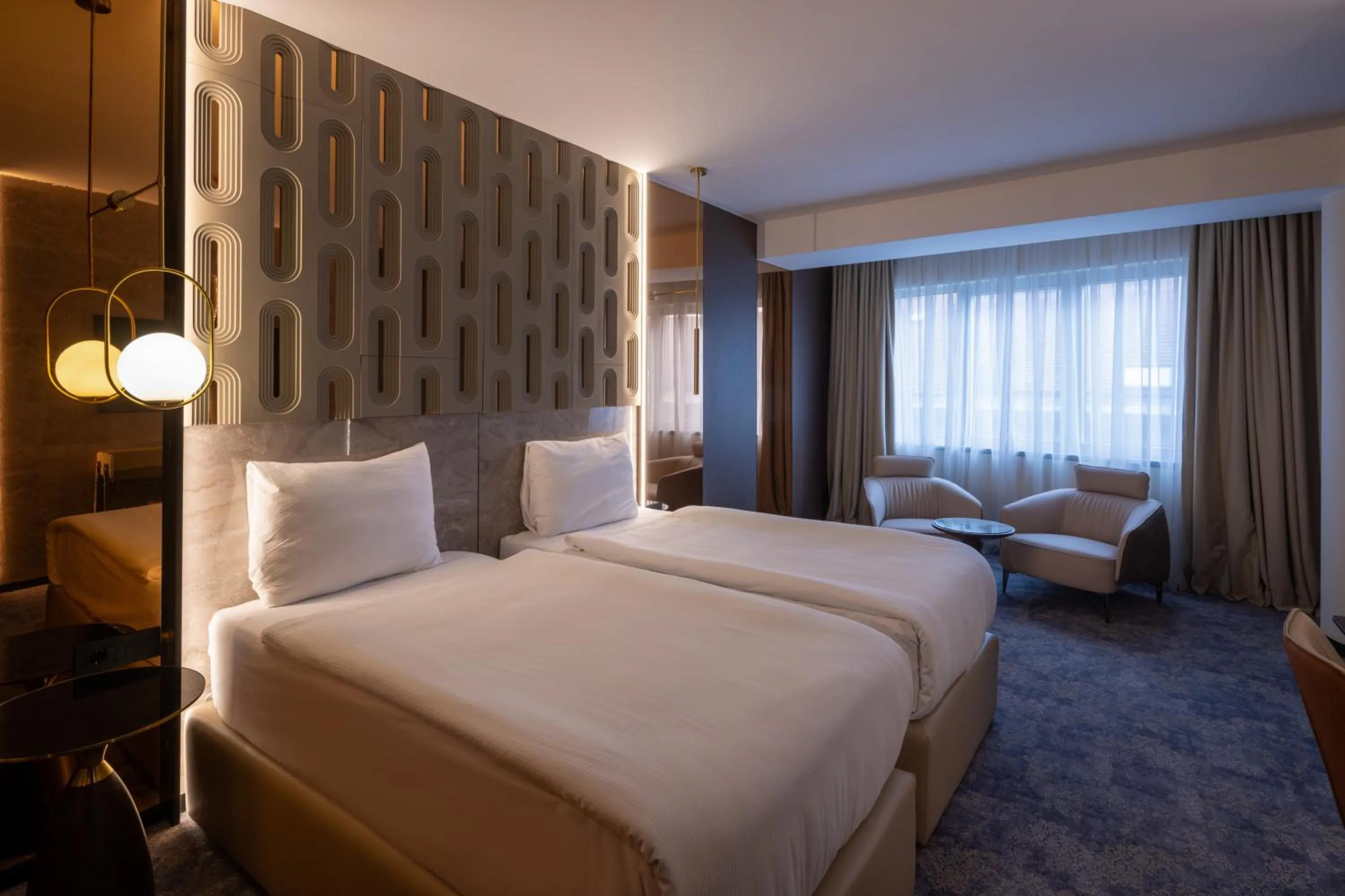 Bed in Nobel Design Hotel