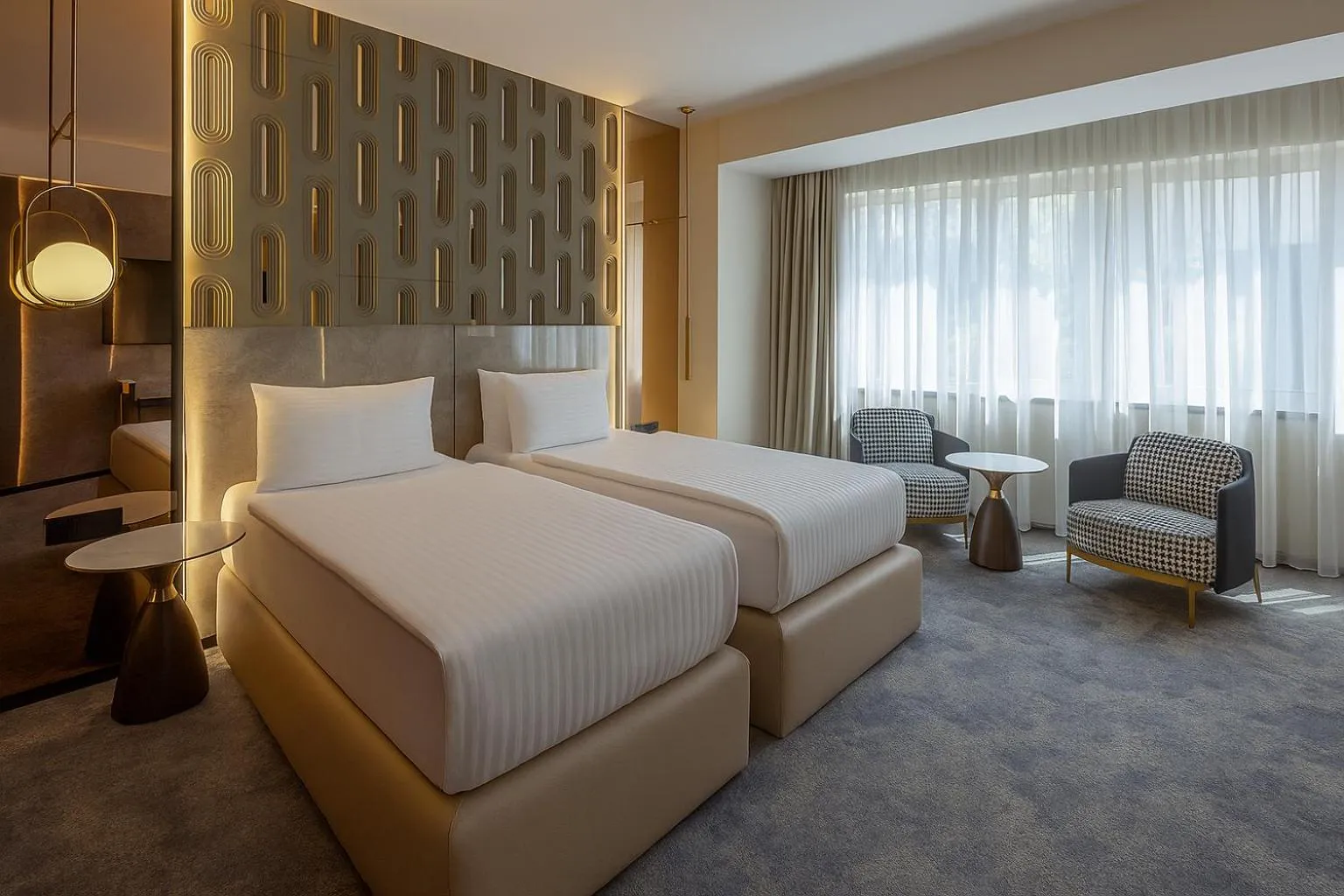 Bed in Nobel Design Hotel