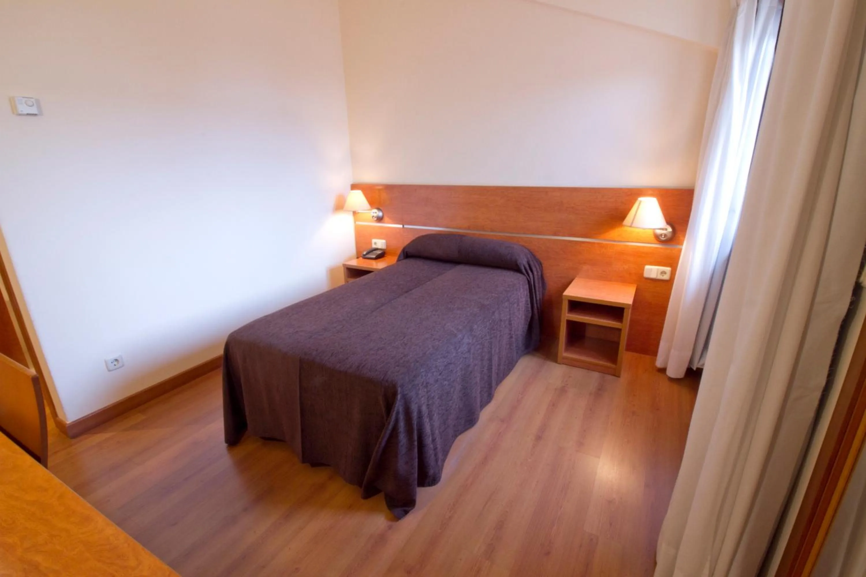 Bed in Hotel Torques