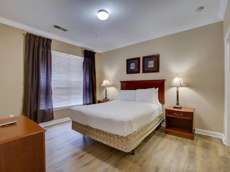 Bed in Poolside condo at Tuscana Resort with Hot Tub