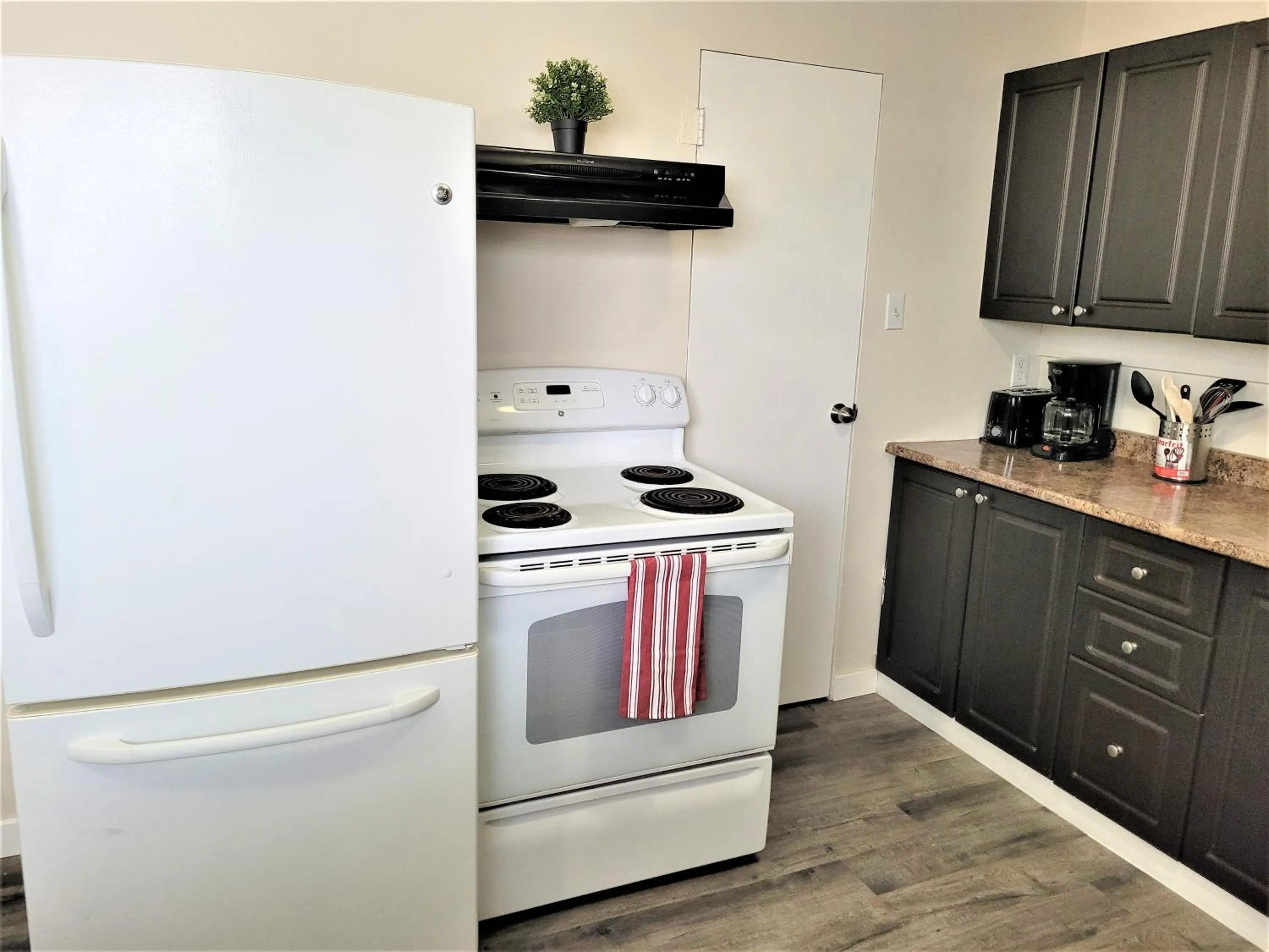 Kitchen or kitchenette in Cozy 4 bedroom townhouse - peaceful feel of home
