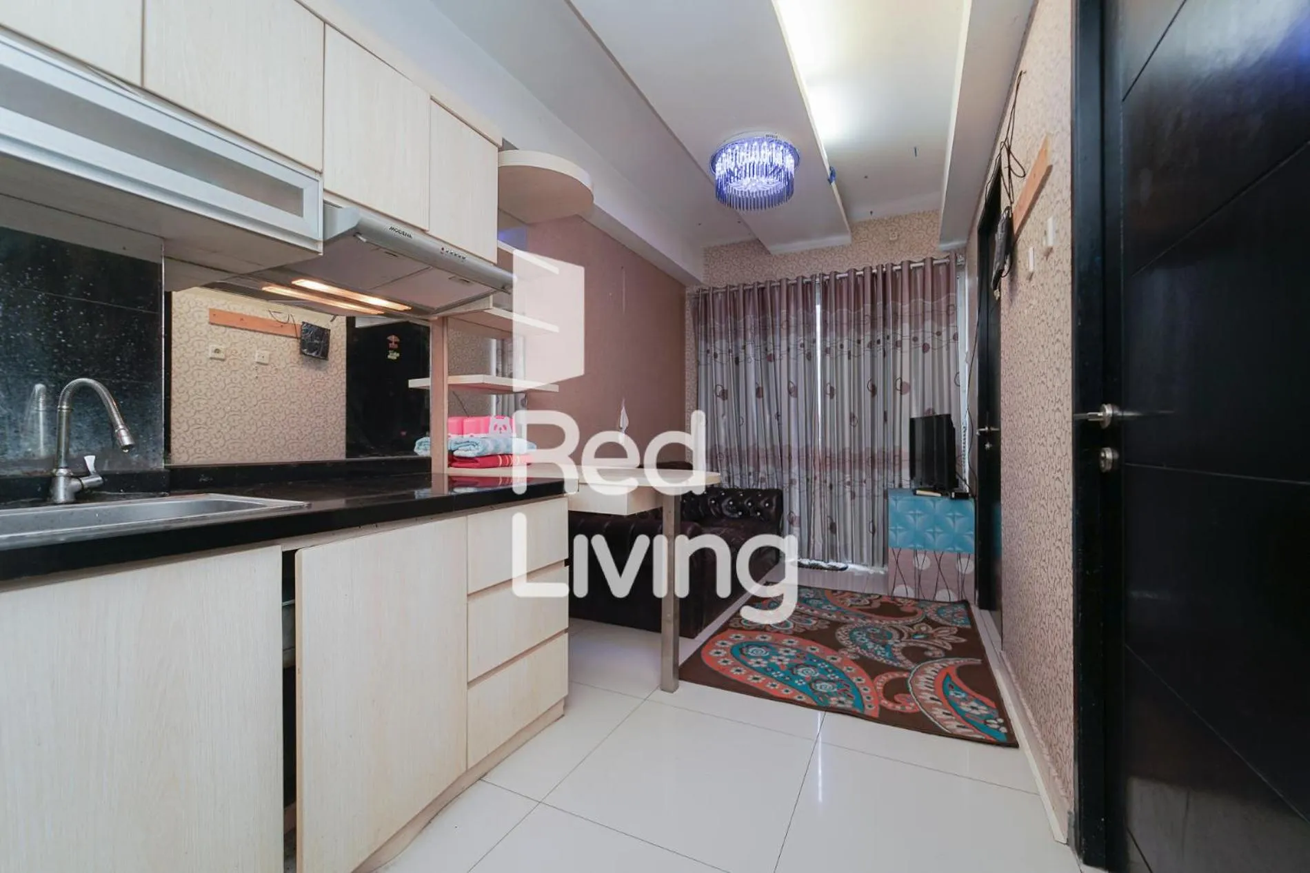 Kitchen or kitchenette in RedLiving Apartemen Paragon Village Karawaci - Ujang Rooms