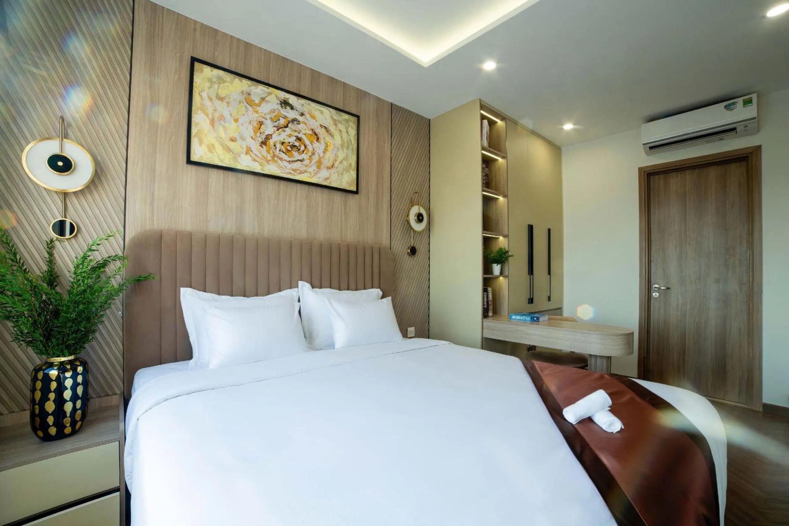 Bed in Otis Soho Saigon Balcony Apartment