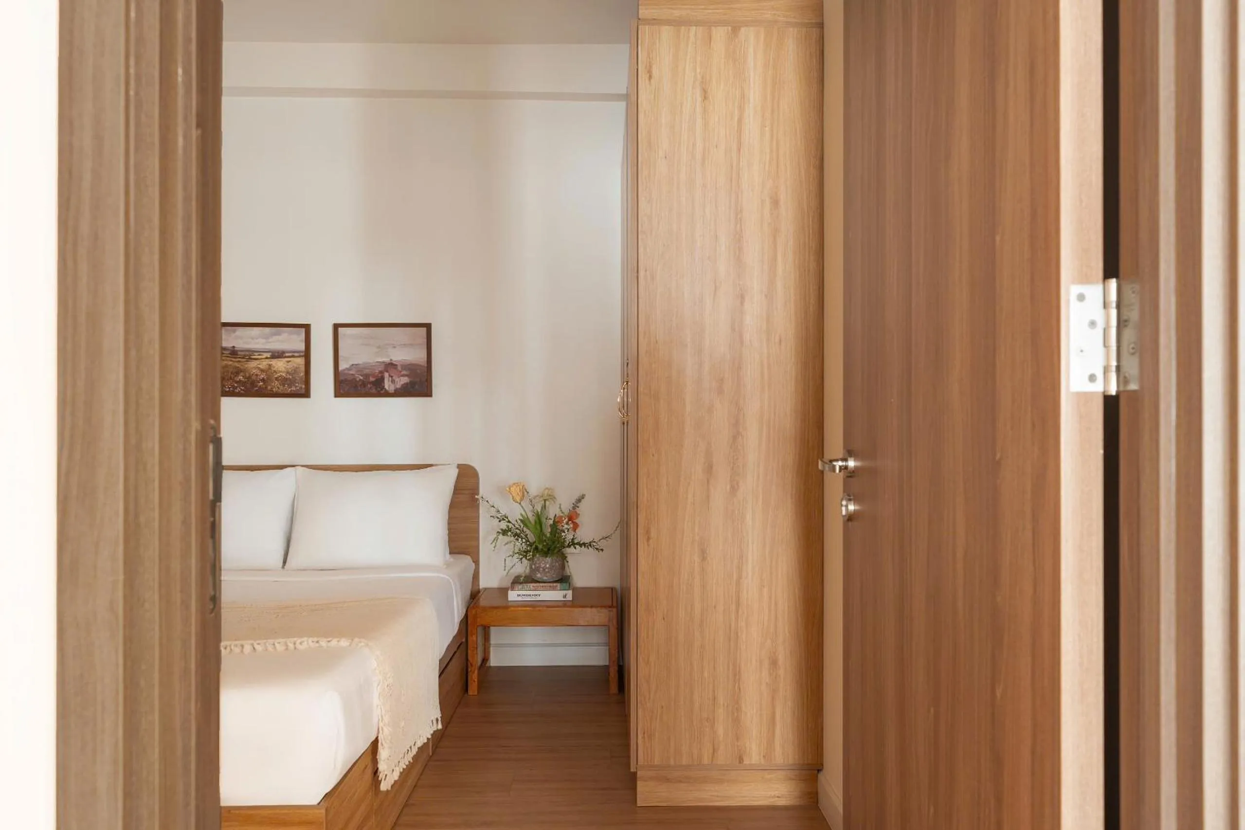 Bed in Otis Soho Saigon Balcony Apartment