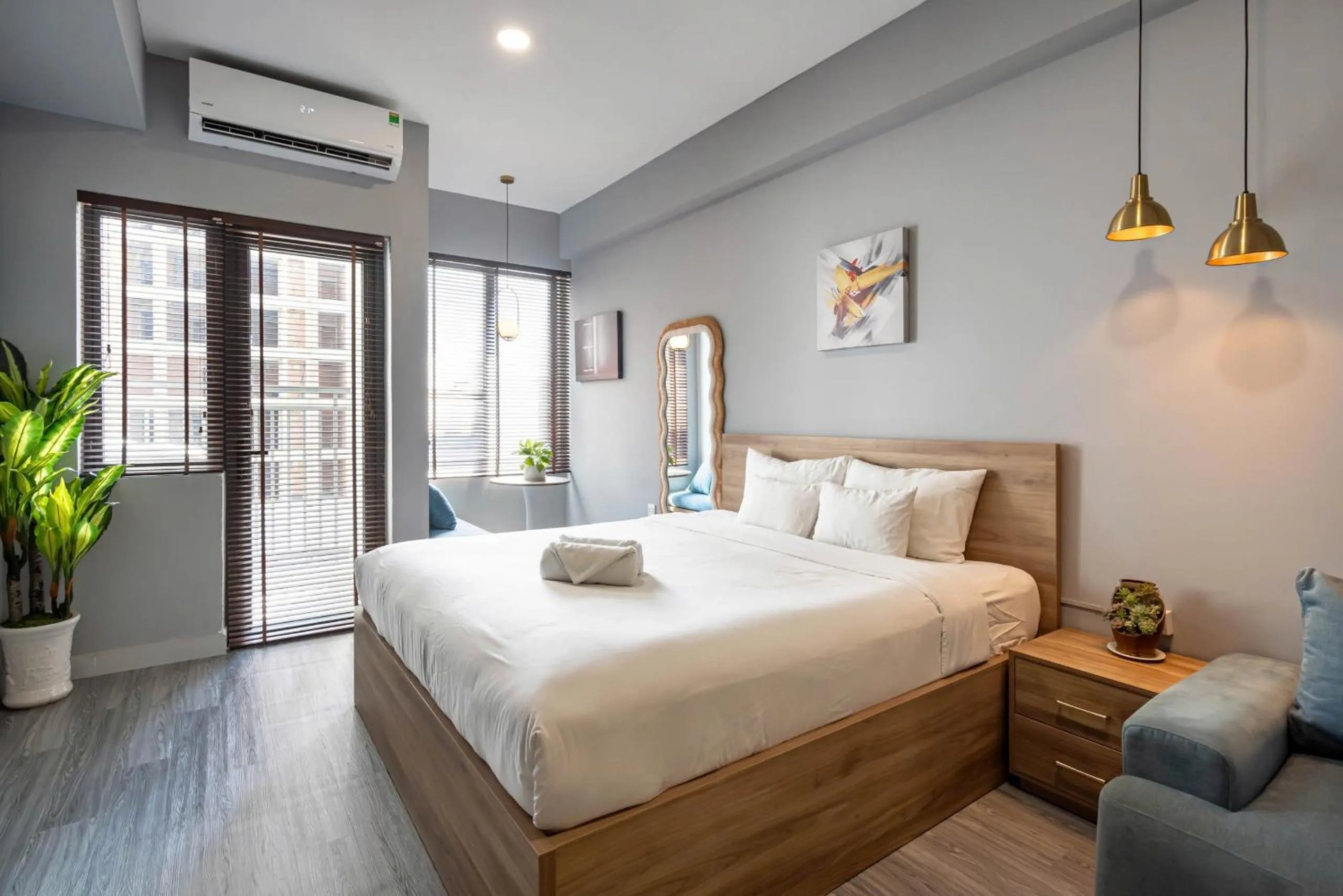Bed in Otis Soho Saigon Balcony Apartment