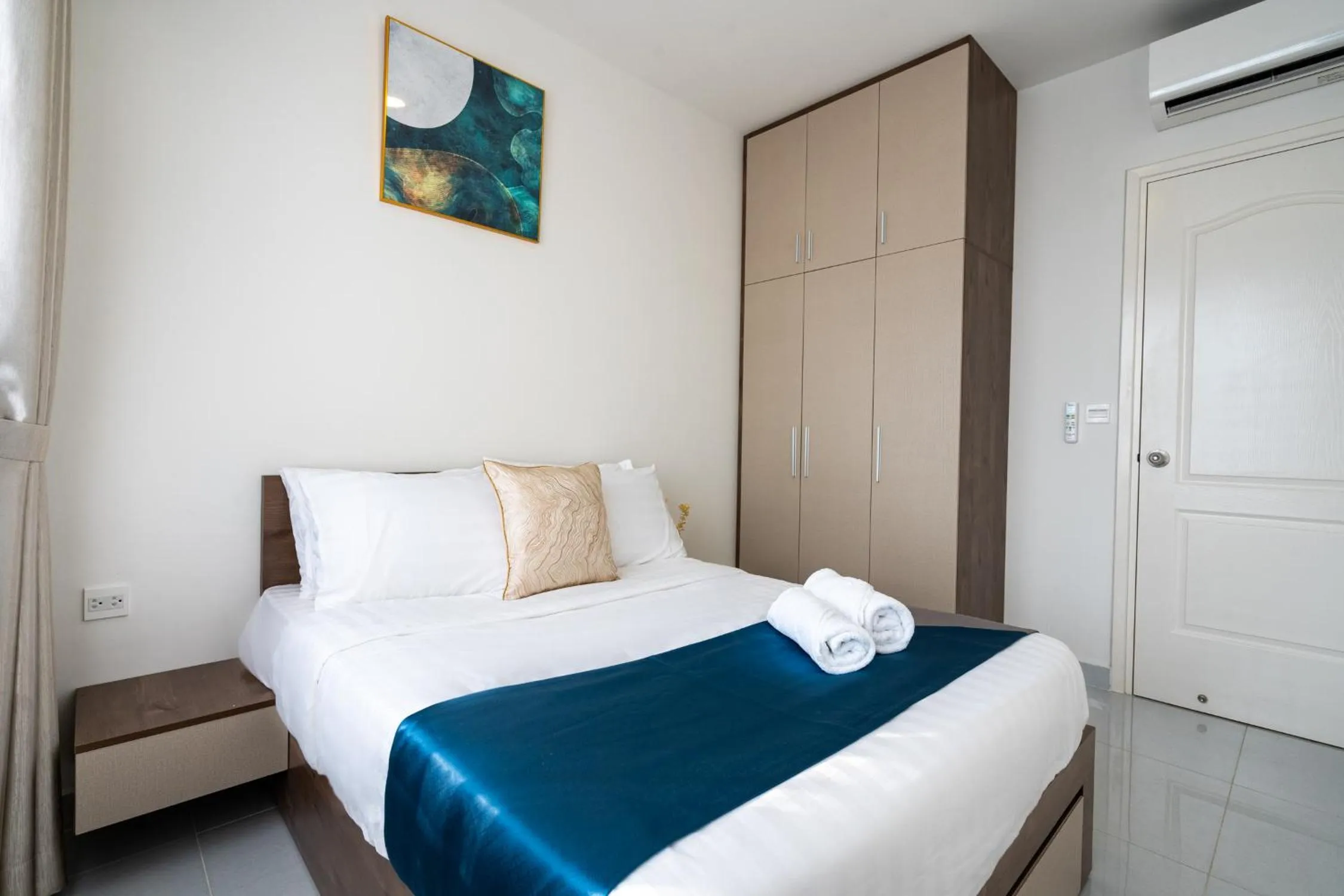 Bed in Otis Soho Saigon Balcony Apartment