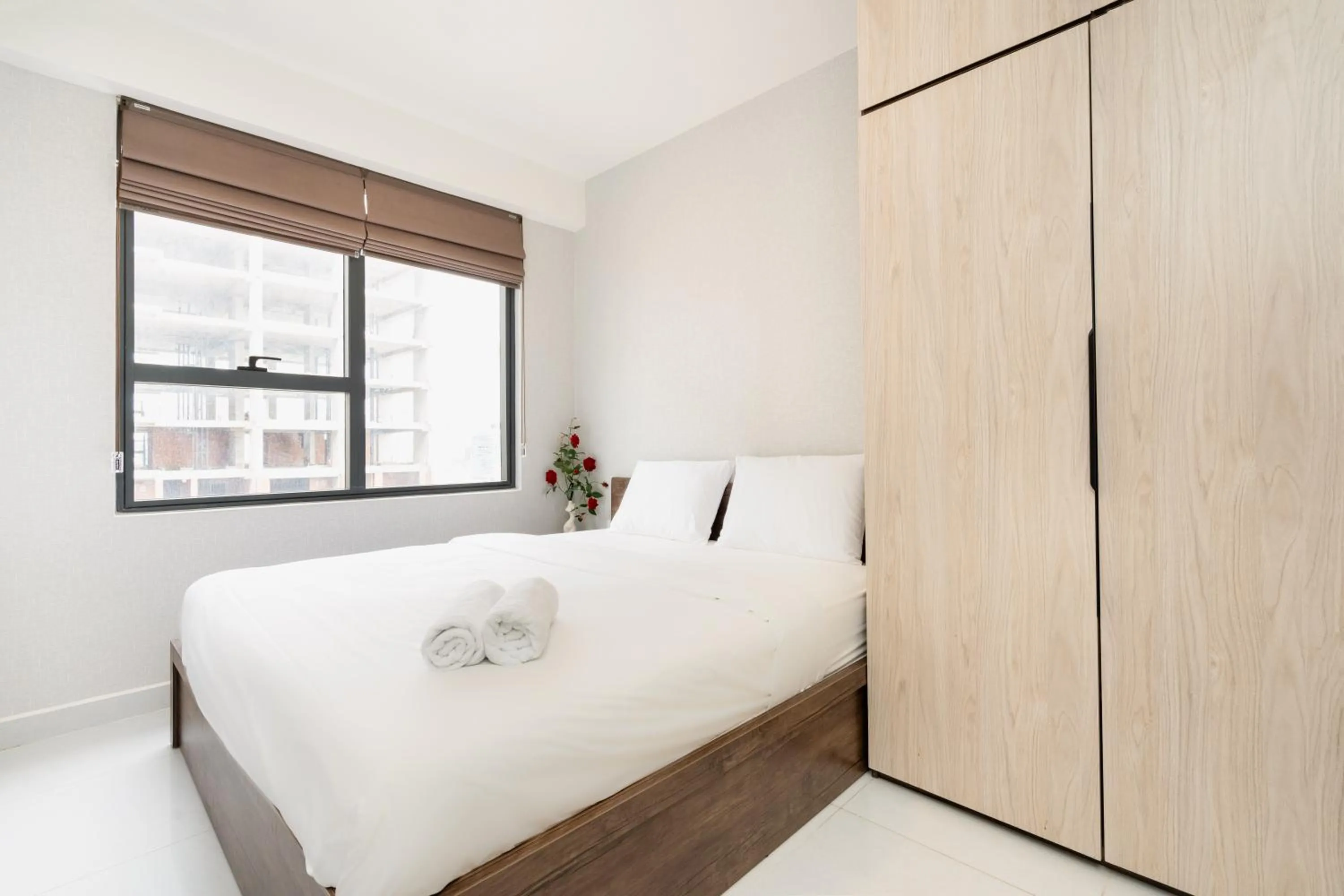 Bed in Otis Soho Saigon Balcony Apartment