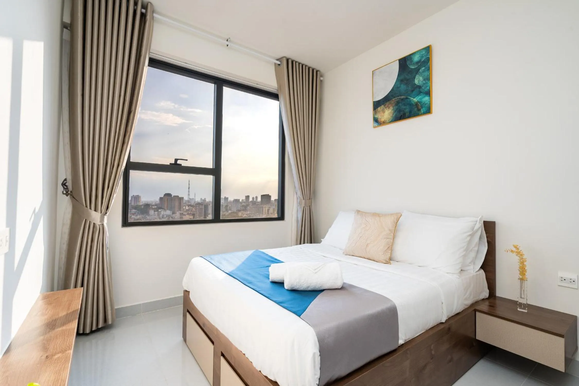 Bed in Otis Soho Saigon Balcony Apartment