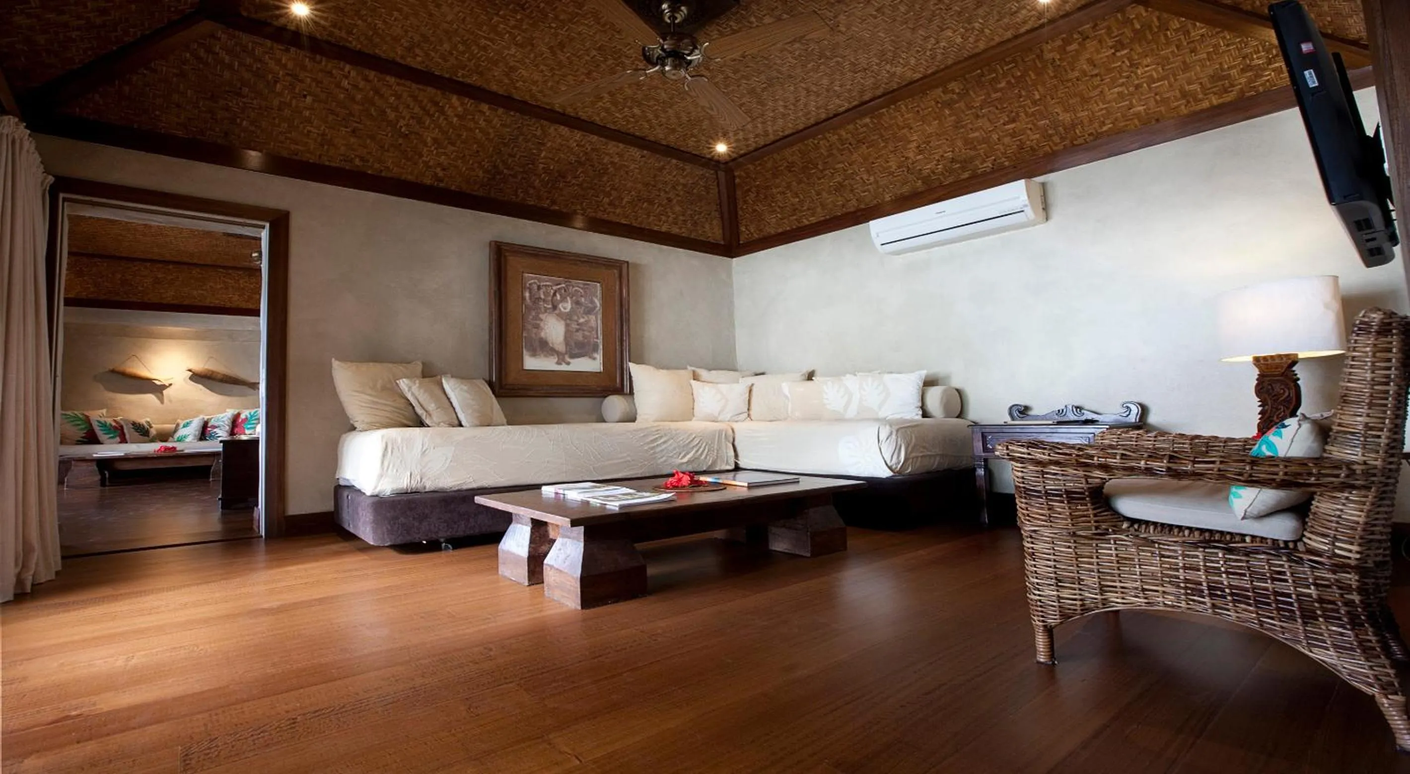 Seating area, Bed in Pacific Resort Aitutaki - Adults Only