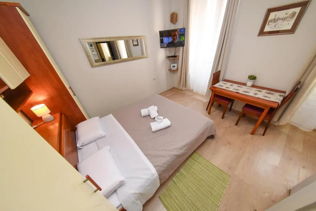 Bed in Apartment Zaratino