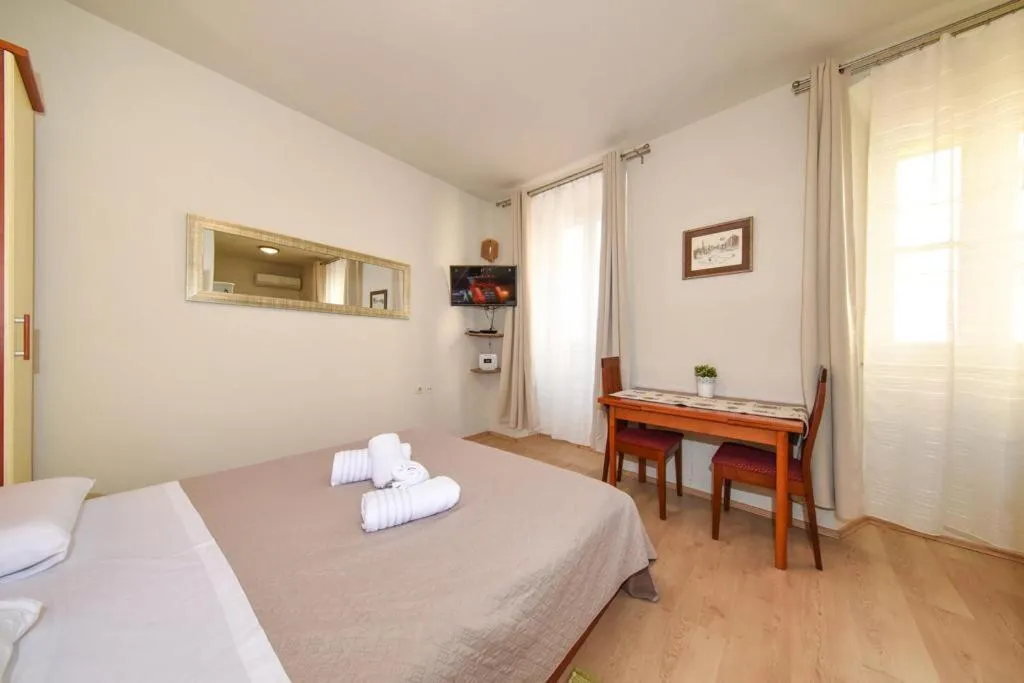Bed in Apartment Zaratino