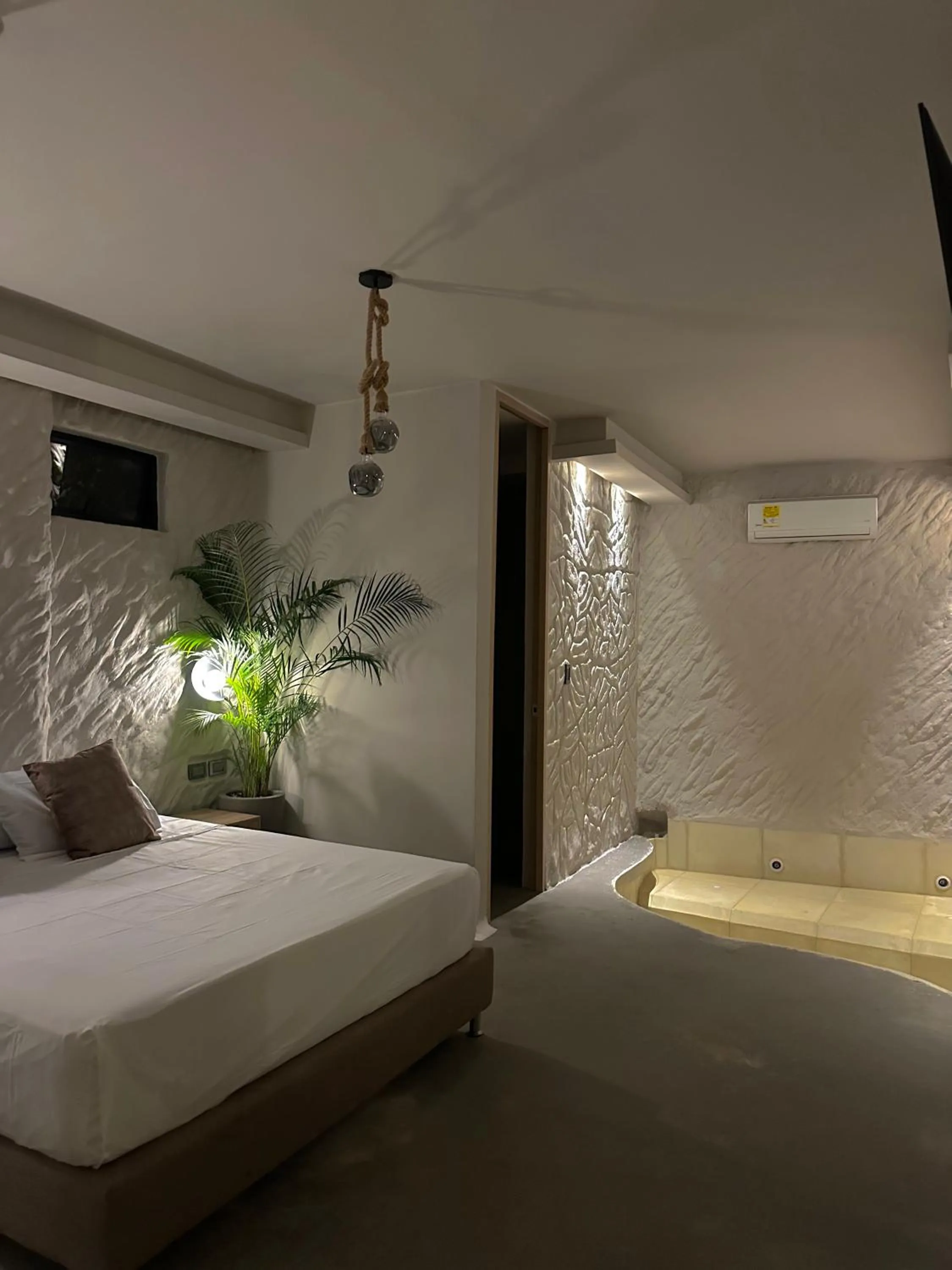 Photo of the whole room, Bed in HOTEL BALI AT POBLADO