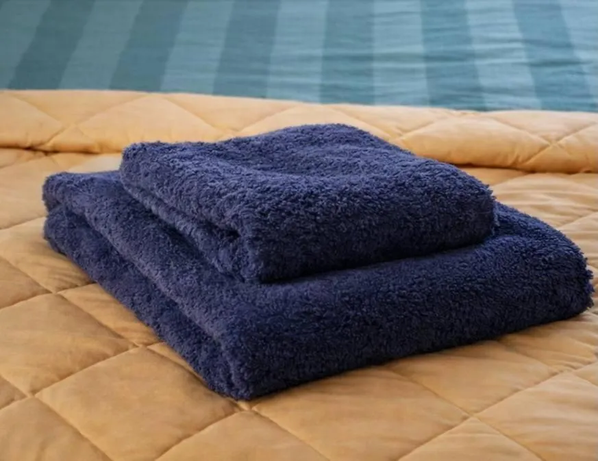 towels, Bed in THE EARN HOTEL