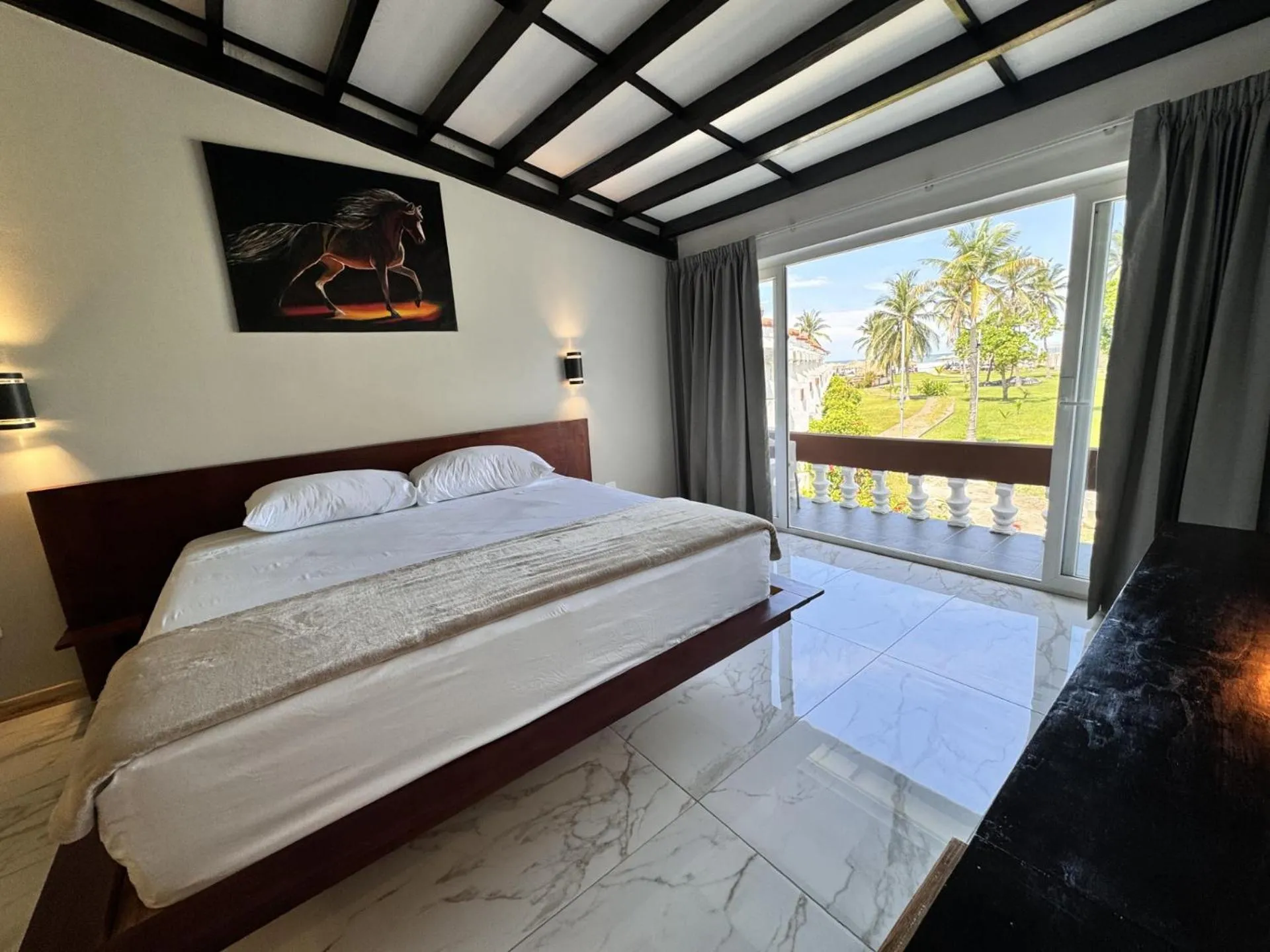 Bed in HOTEL TESORO BEACH