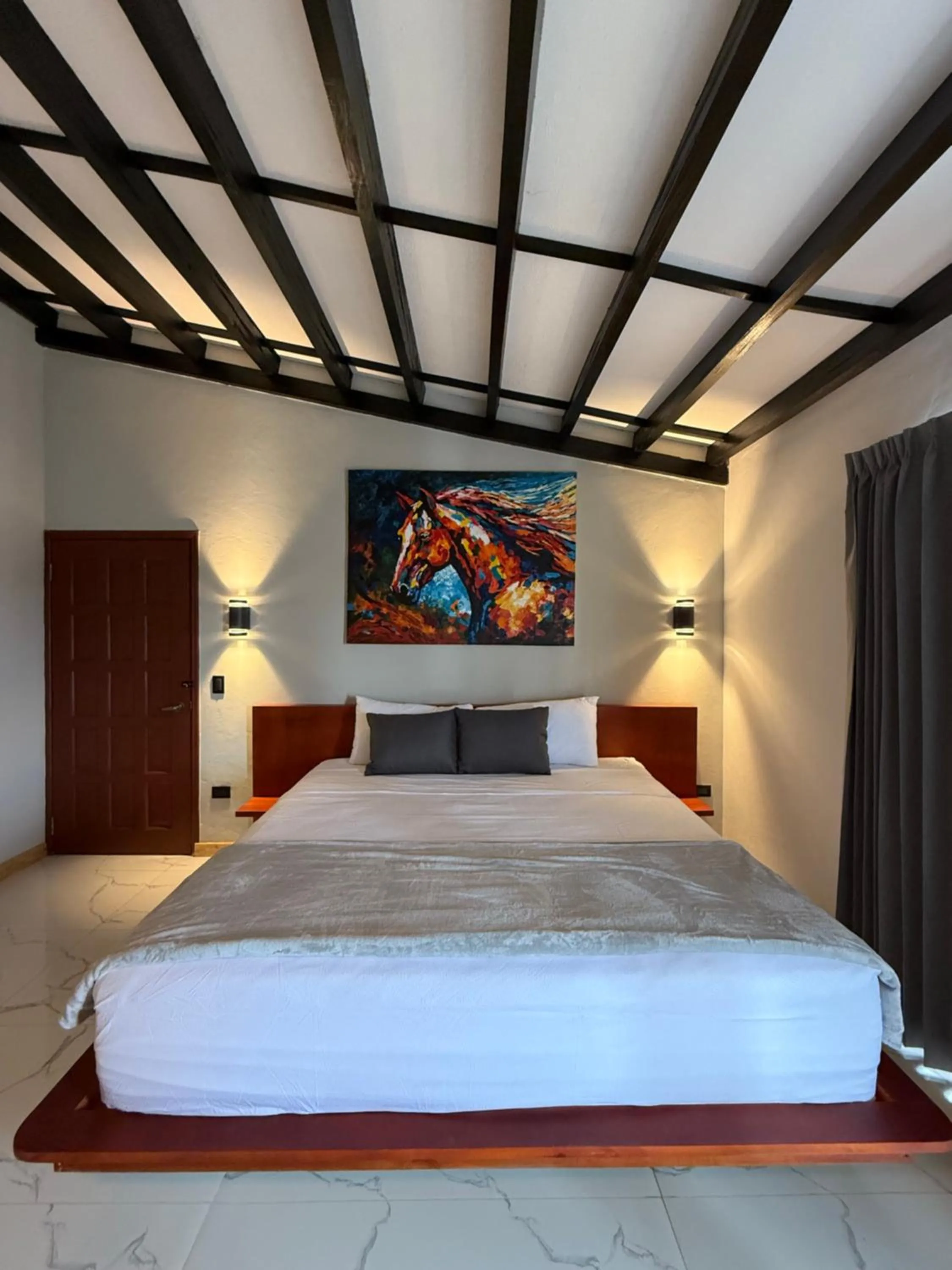 Bed in HOTEL TESORO BEACH