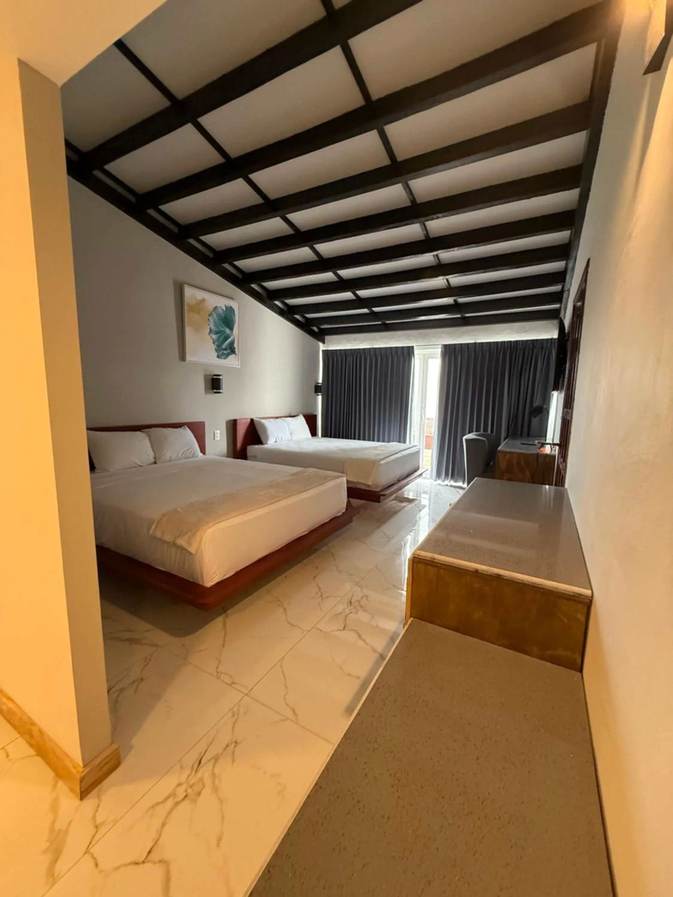 Bed in HOTEL TESORO BEACH