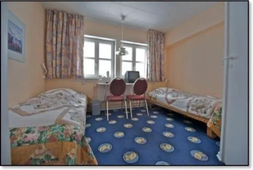 Photo of the whole room, Bed in Hotel Kulusuk