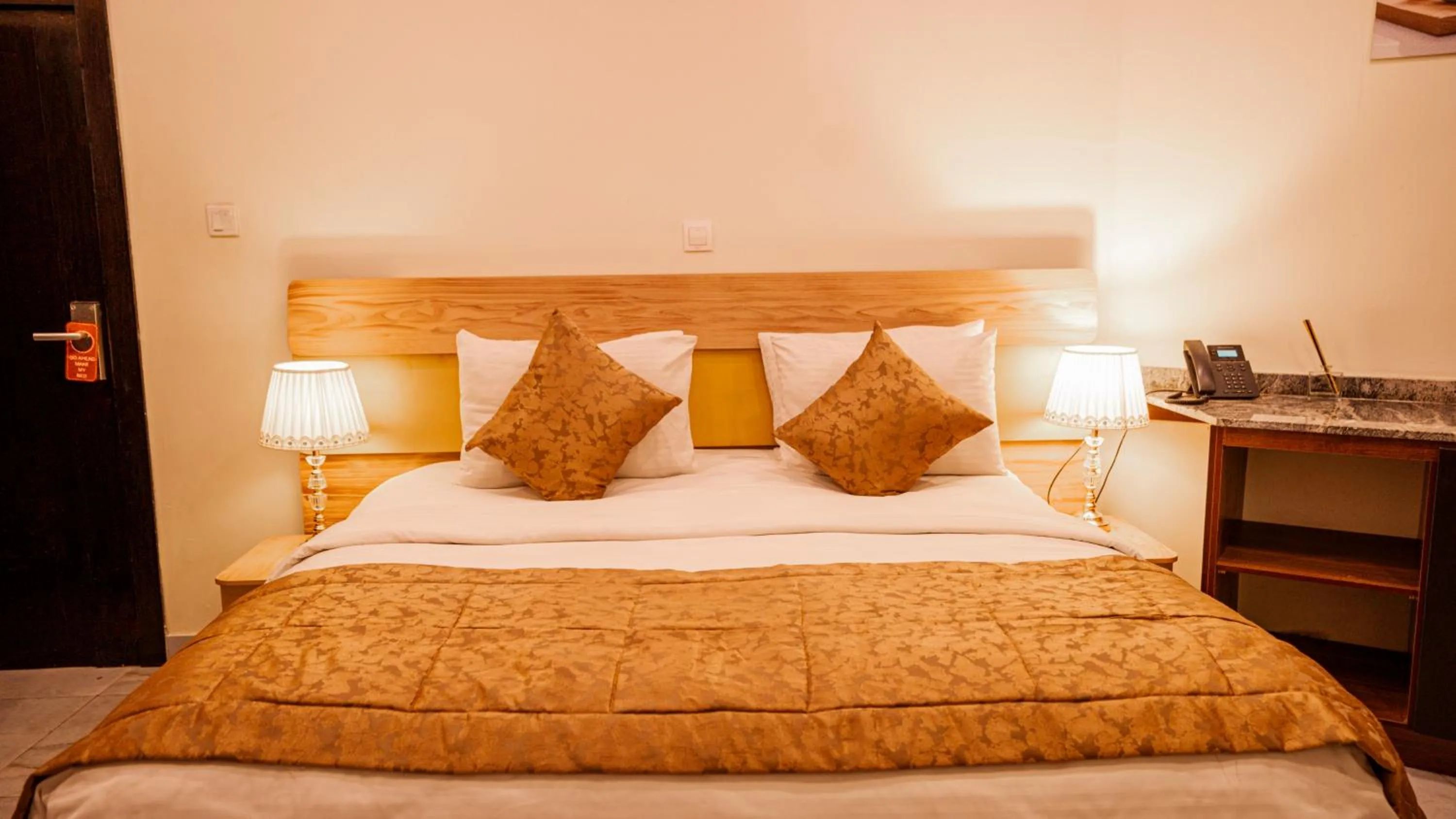 Bed in Providha Hotel & Suites