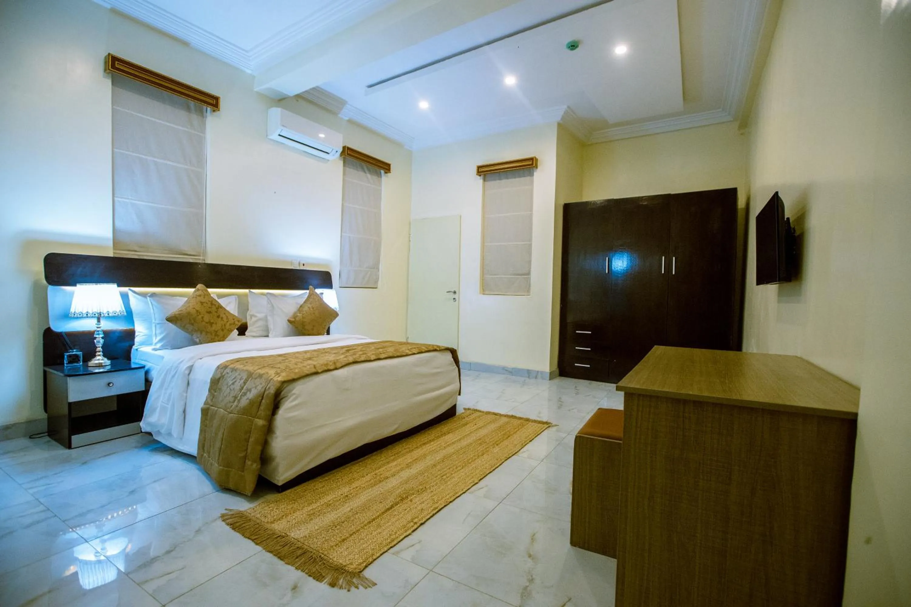 Bed in Providha Hotel & Suites