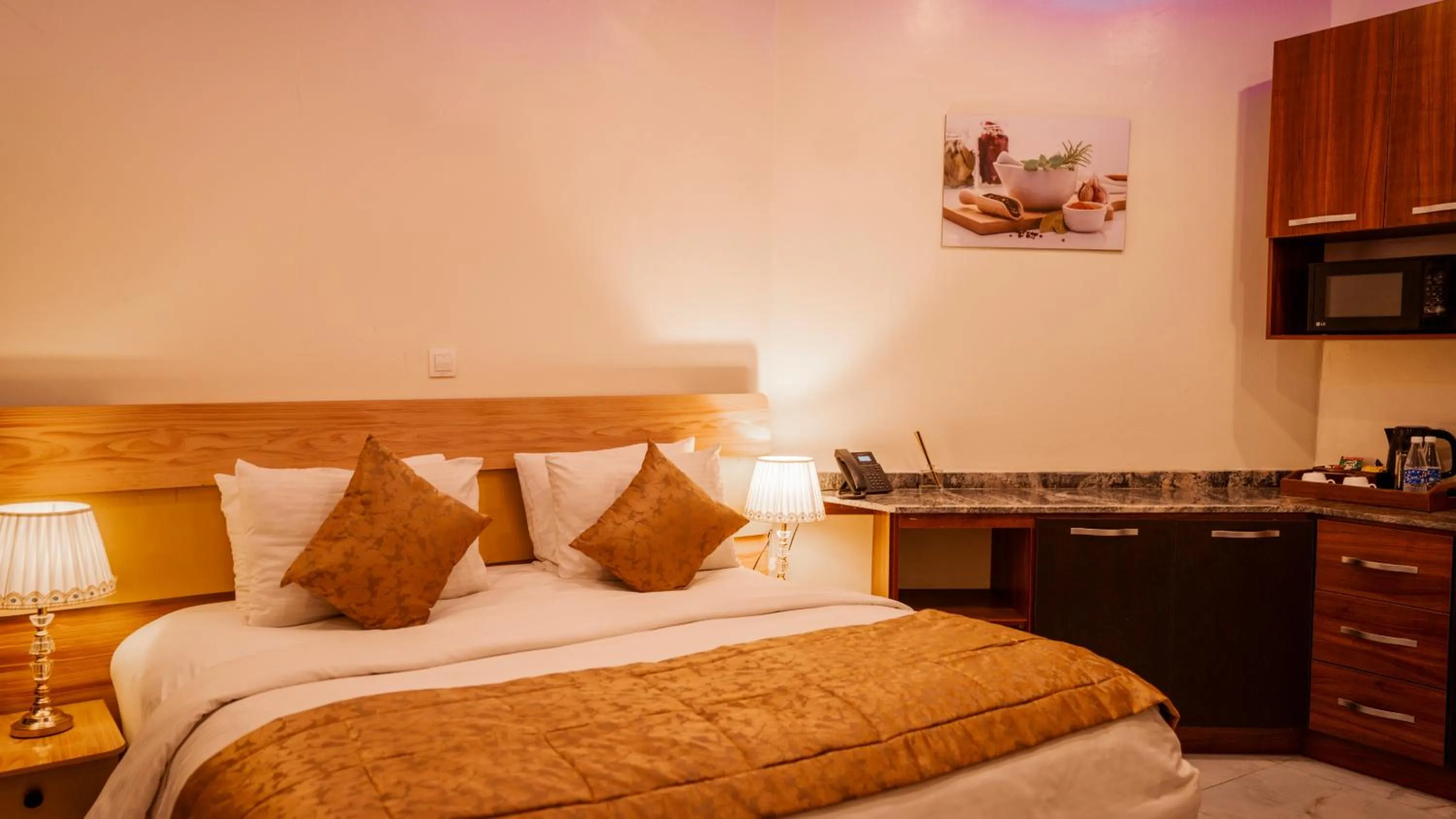 Bed in Providha Hotel & Suites
