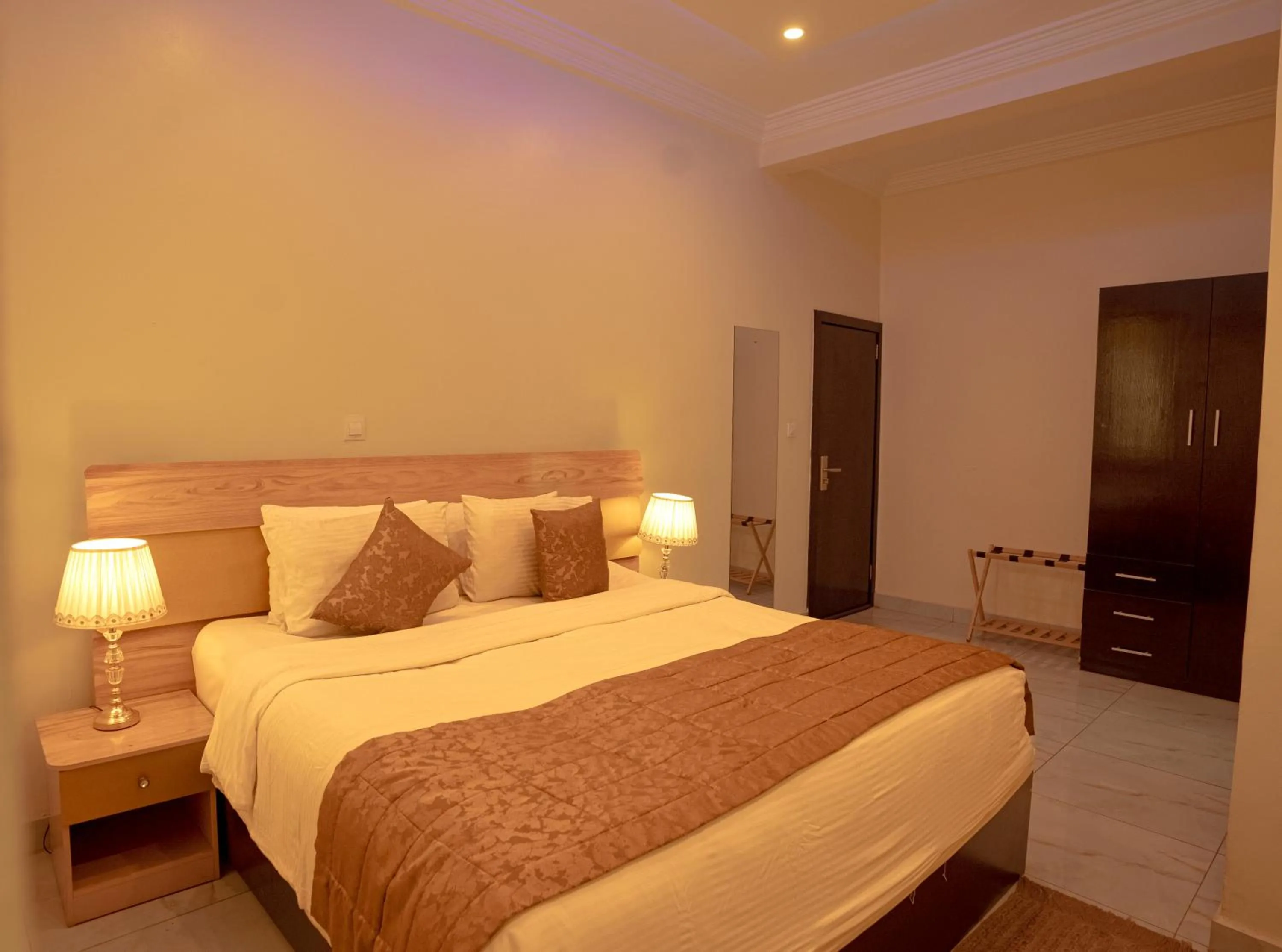 Bed in Providha Hotel & Suites