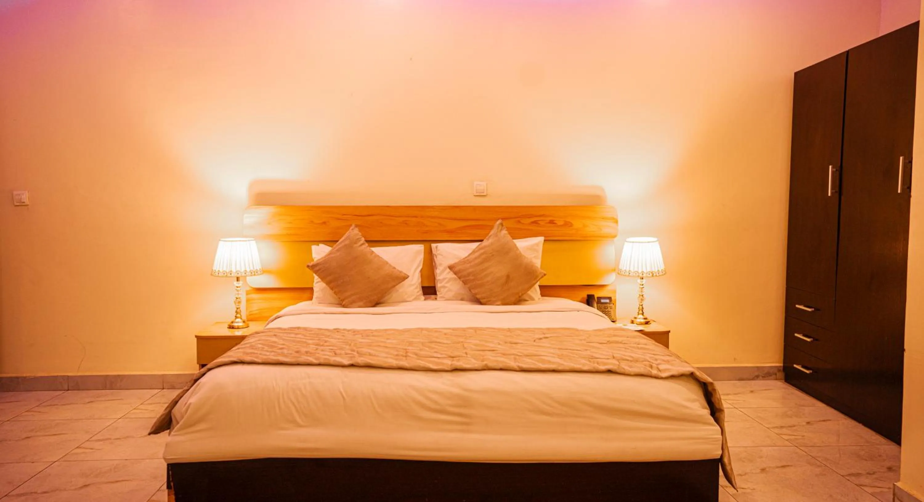 Bed in Providha Hotel & Suites