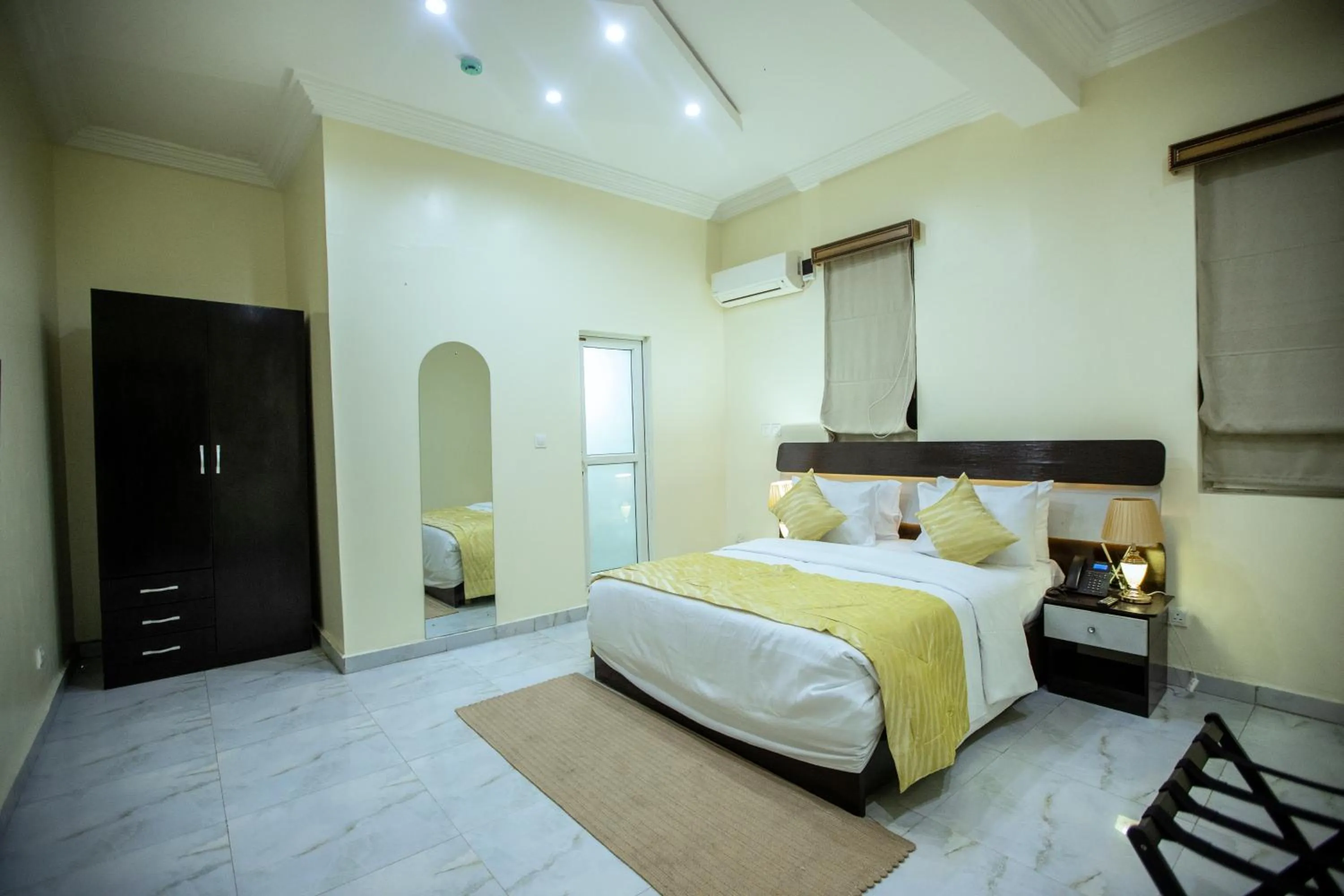 Bed in Providha Hotel & Suites