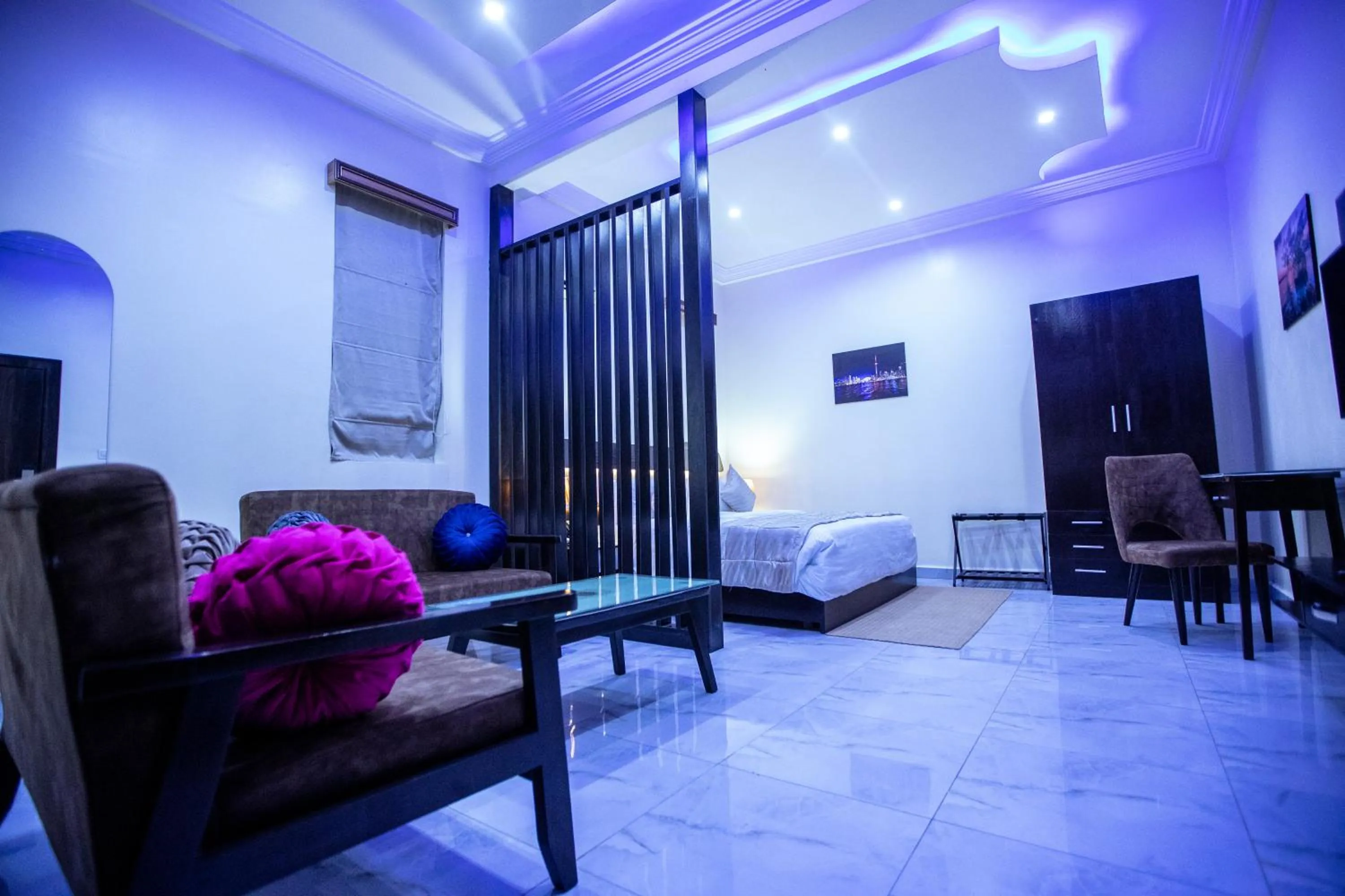 Bed in Providha Hotel & Suites