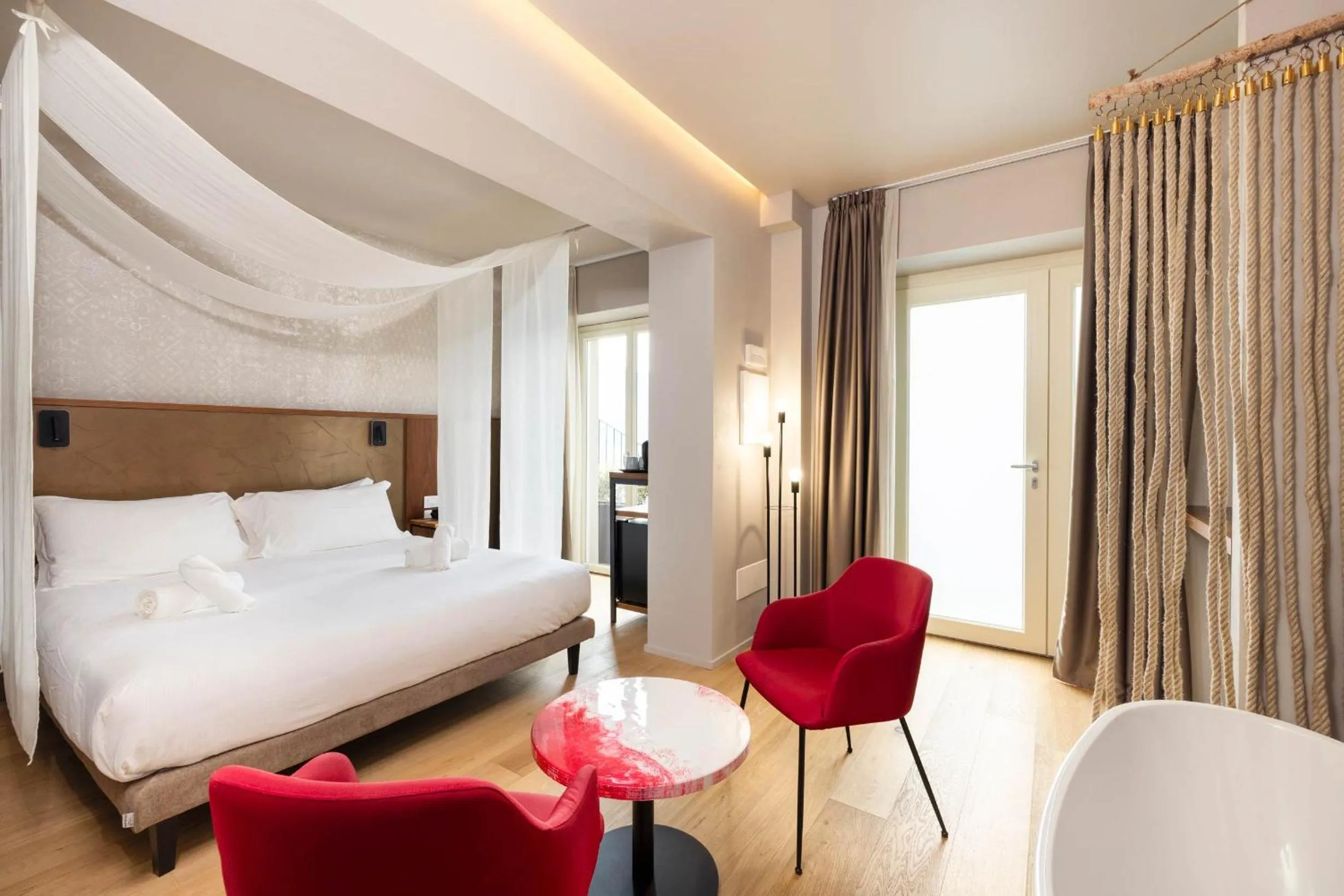 Bed in Villa Clementina Boutique Hotel