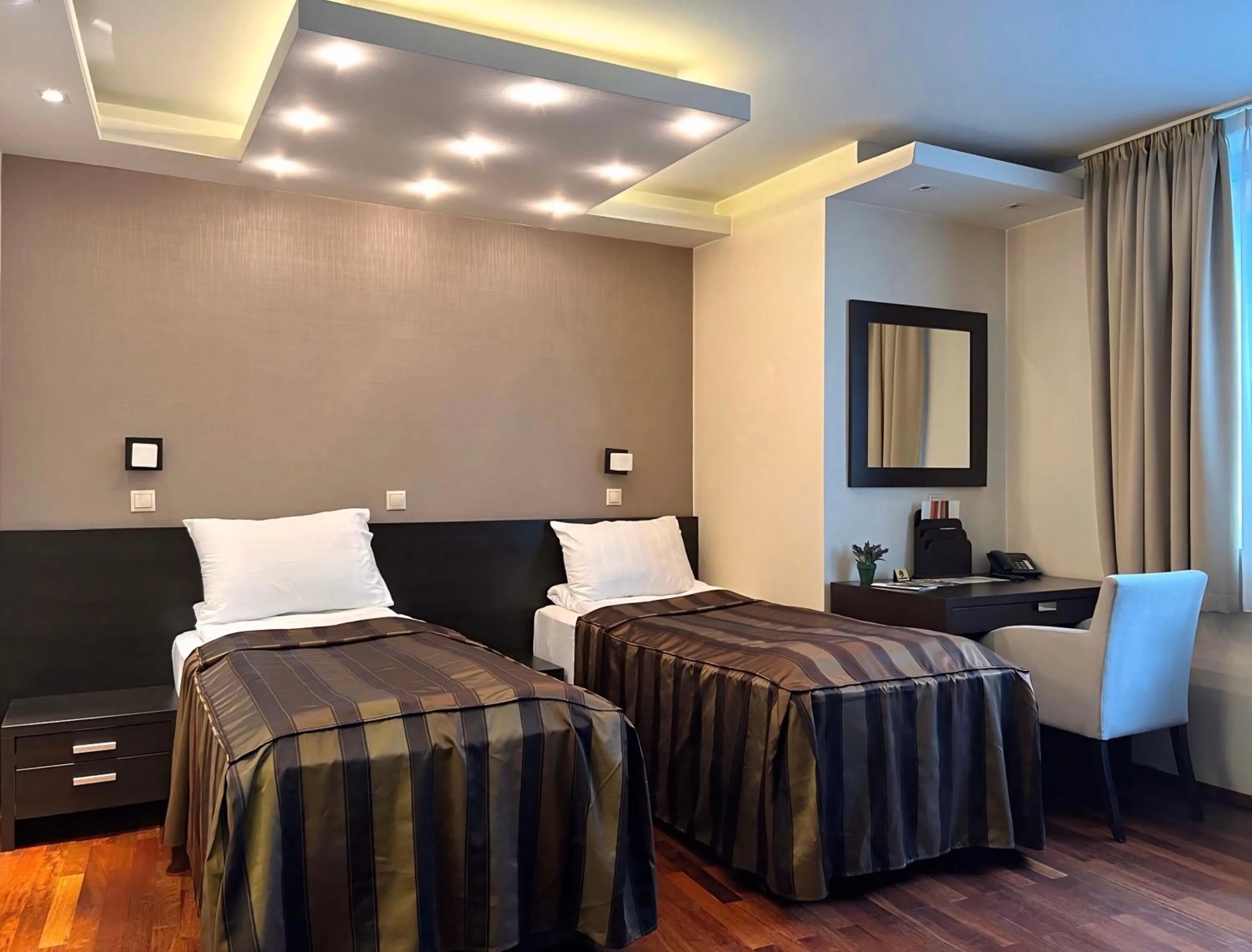 Bed in City Boutique Hotel