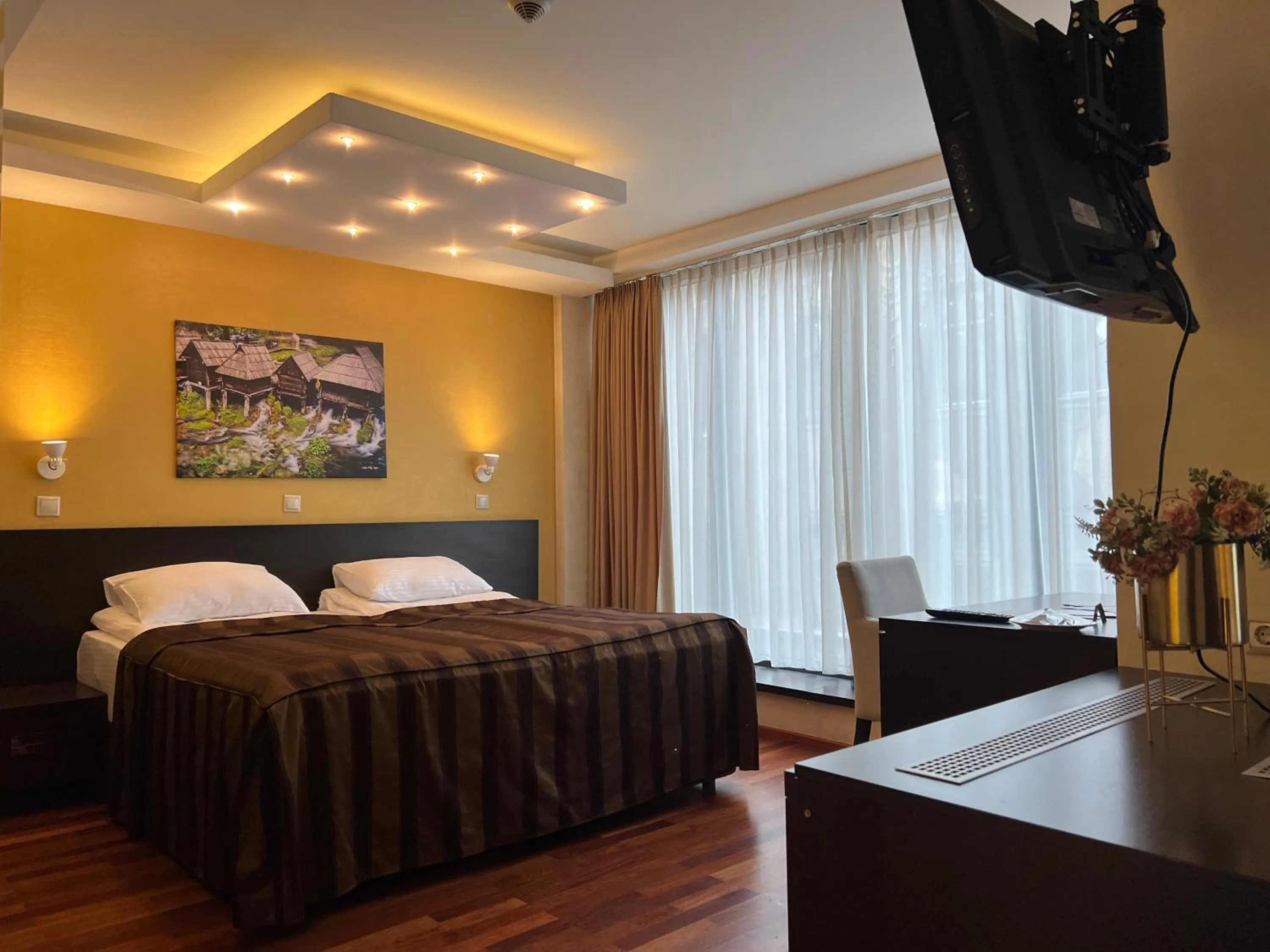 Bed in City Boutique Hotel