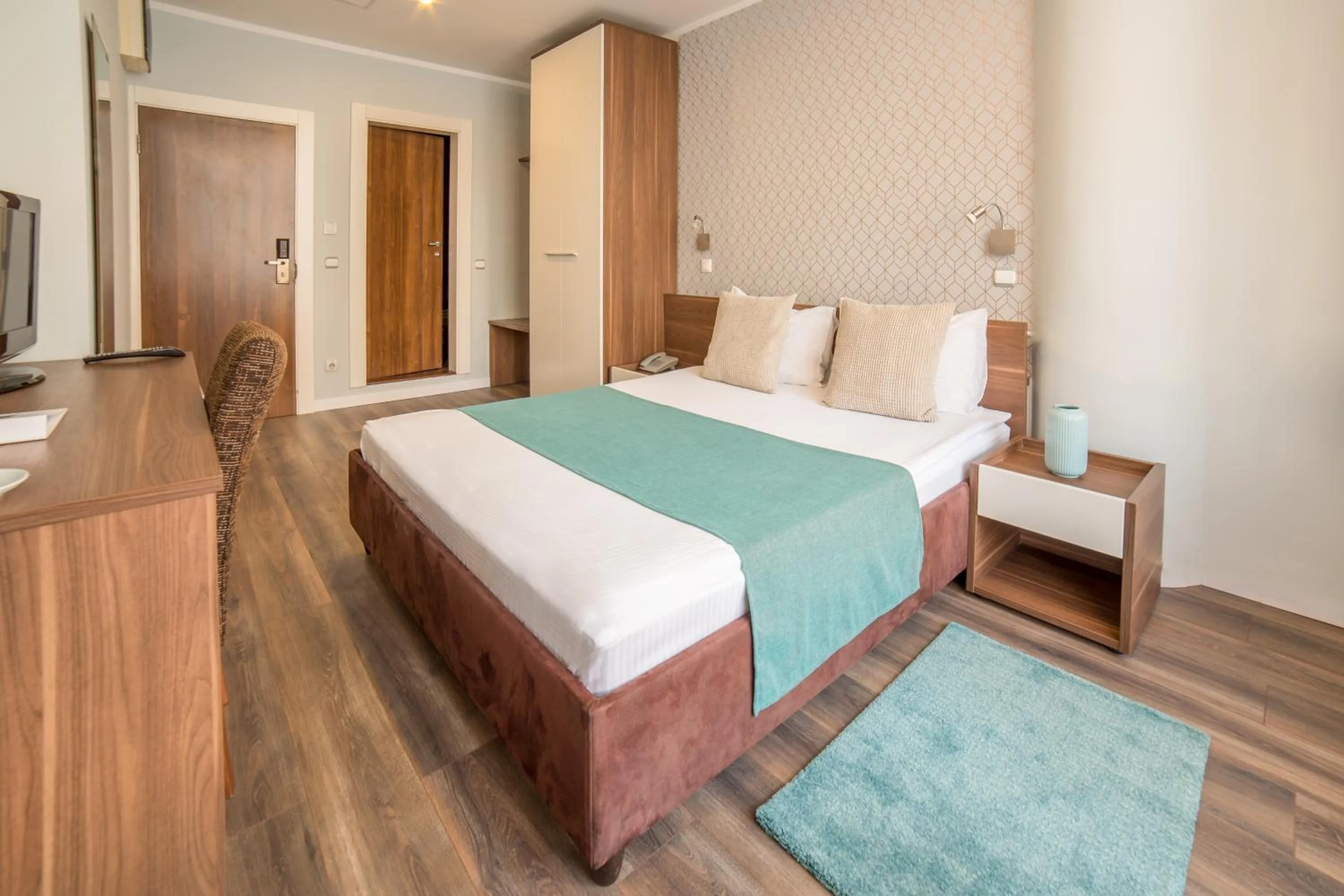 Bed in Balkan Hotel Garni