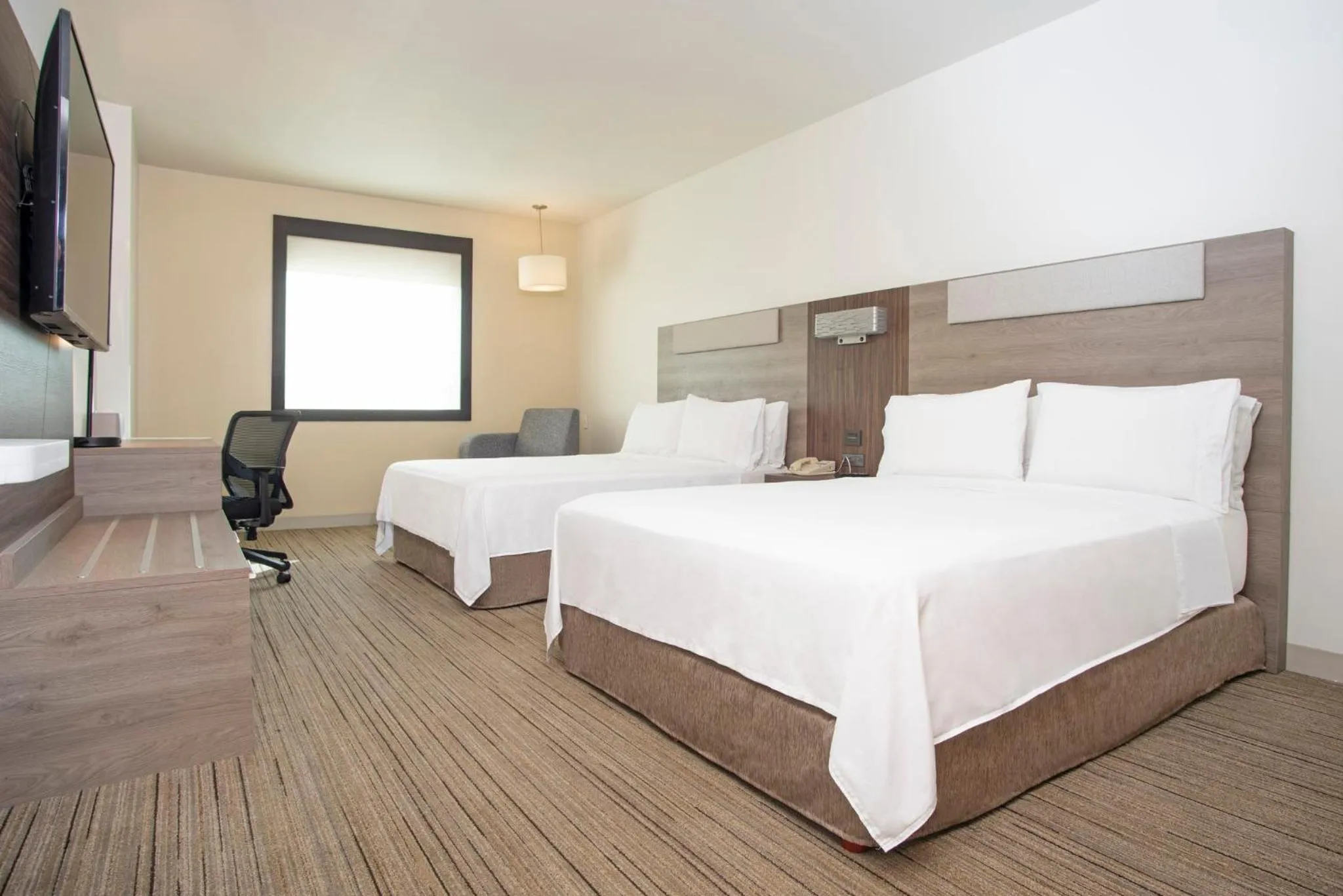 Photo of the whole room, Bed in Holiday Inn Express Guadalajara Iteso by IHG