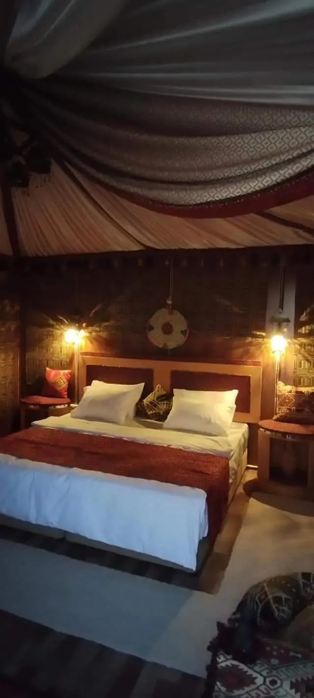 Bed in Wadi Rum Majestic Camp