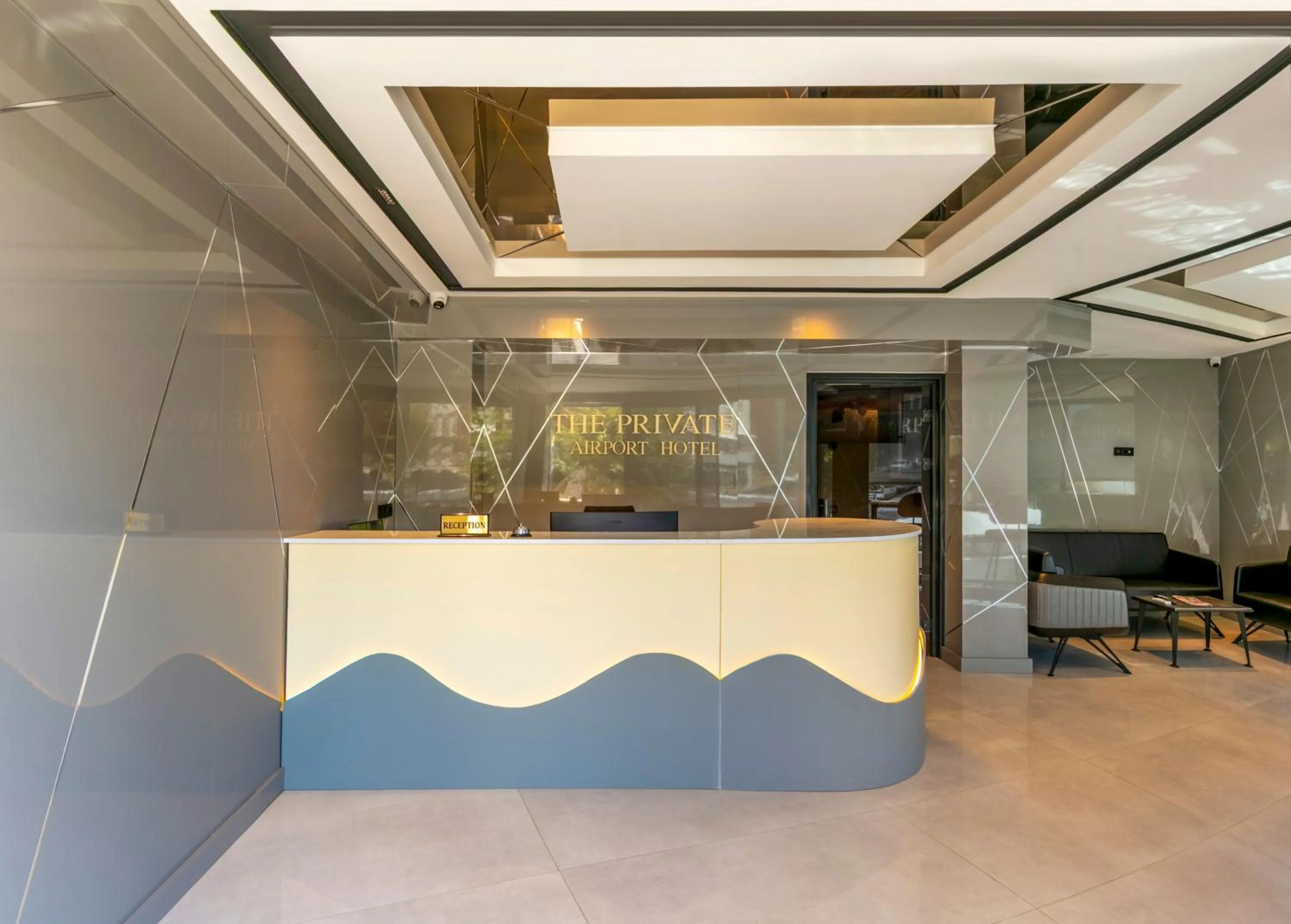 Communal lounge/ TV room in The Private Airport Hotel