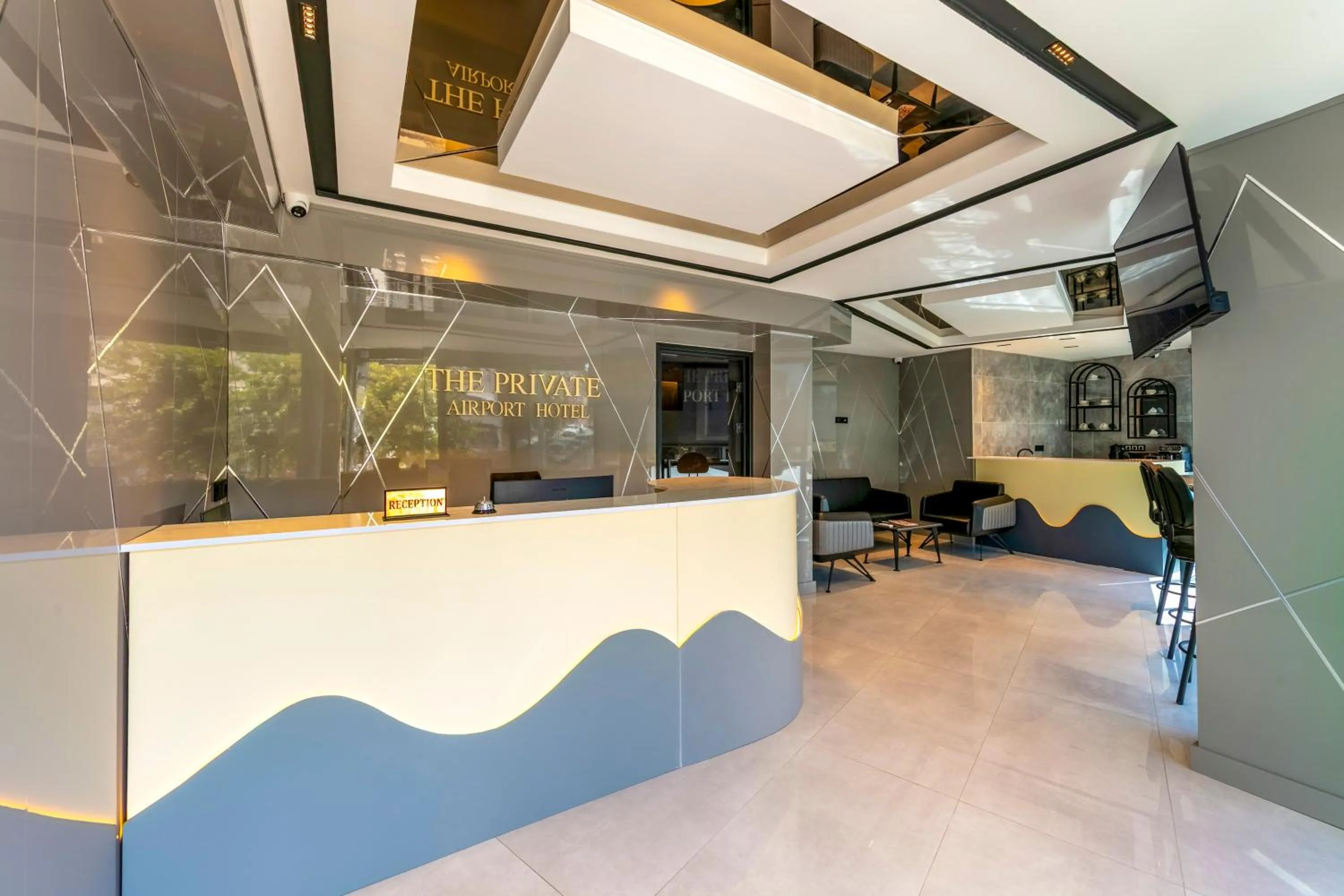 Communal lounge/ TV room in The Private Airport Hotel