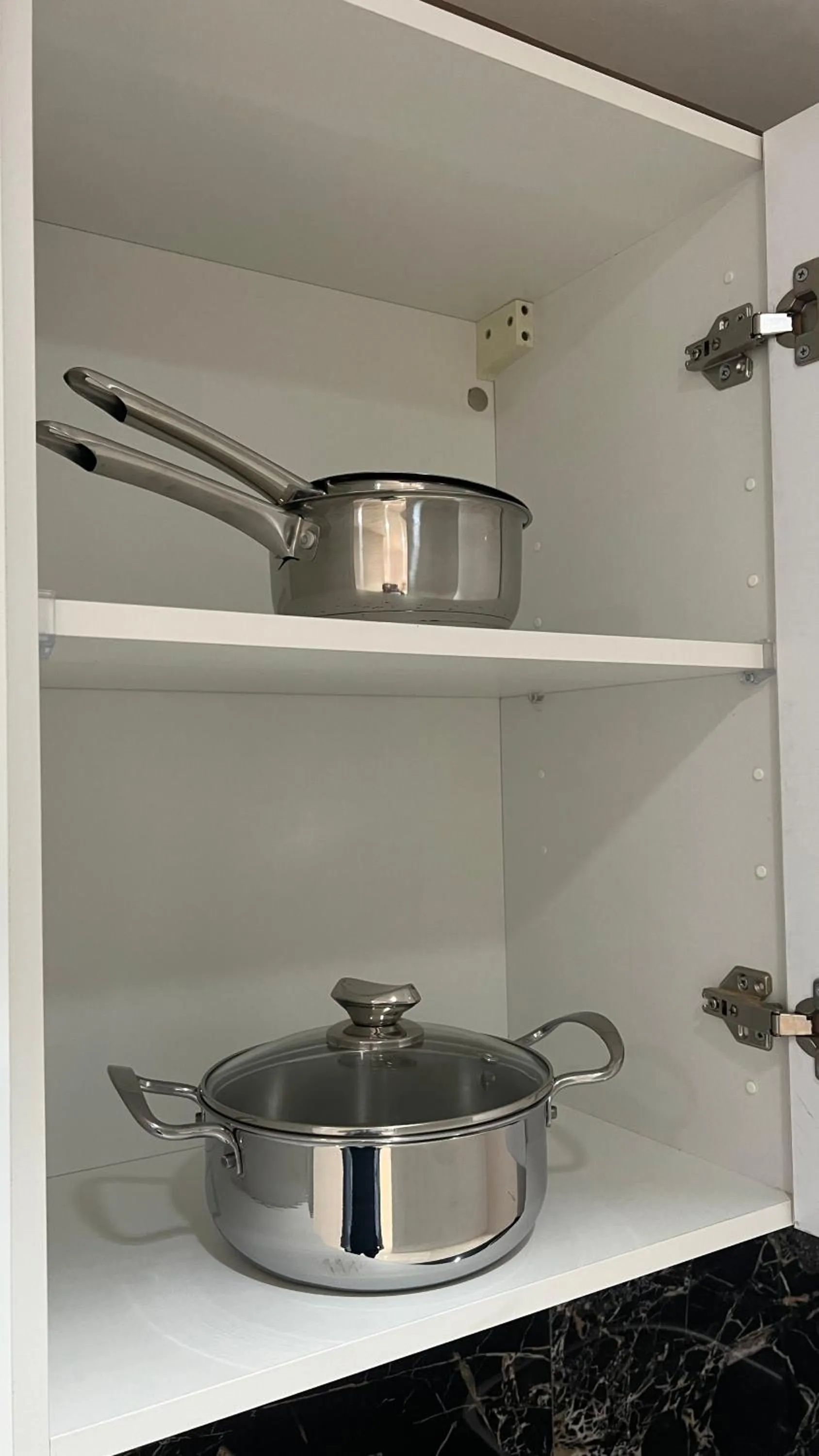 Kitchen or kitchenette in ZEN Suites Hotel Massira