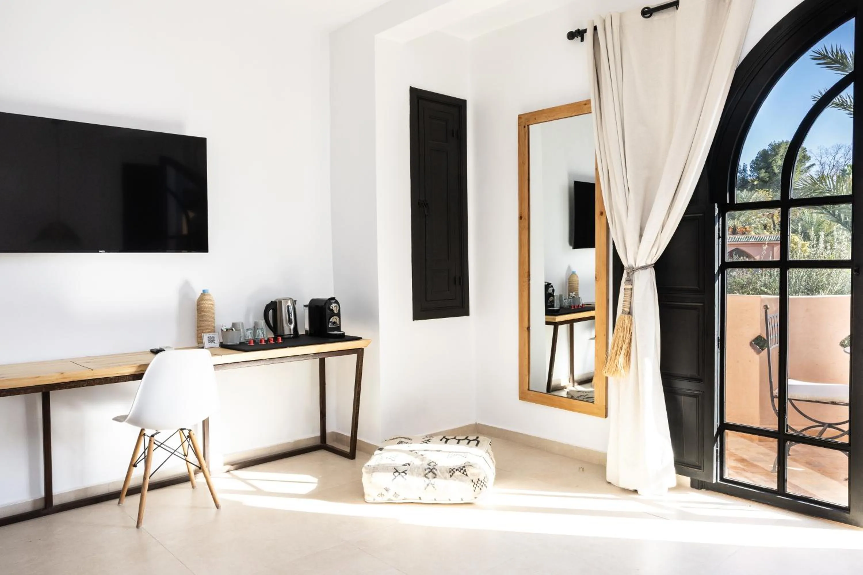 Communal lounge/ TV room in Villa Al Assala Palmeraie