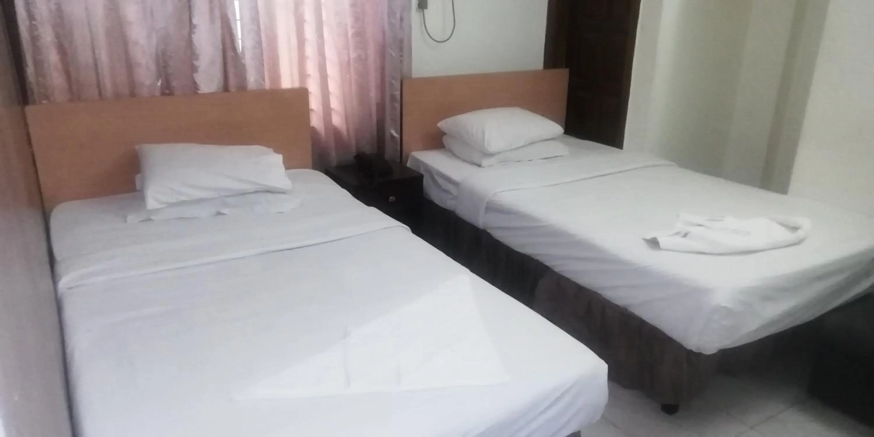 Bed in Hotel Skylink