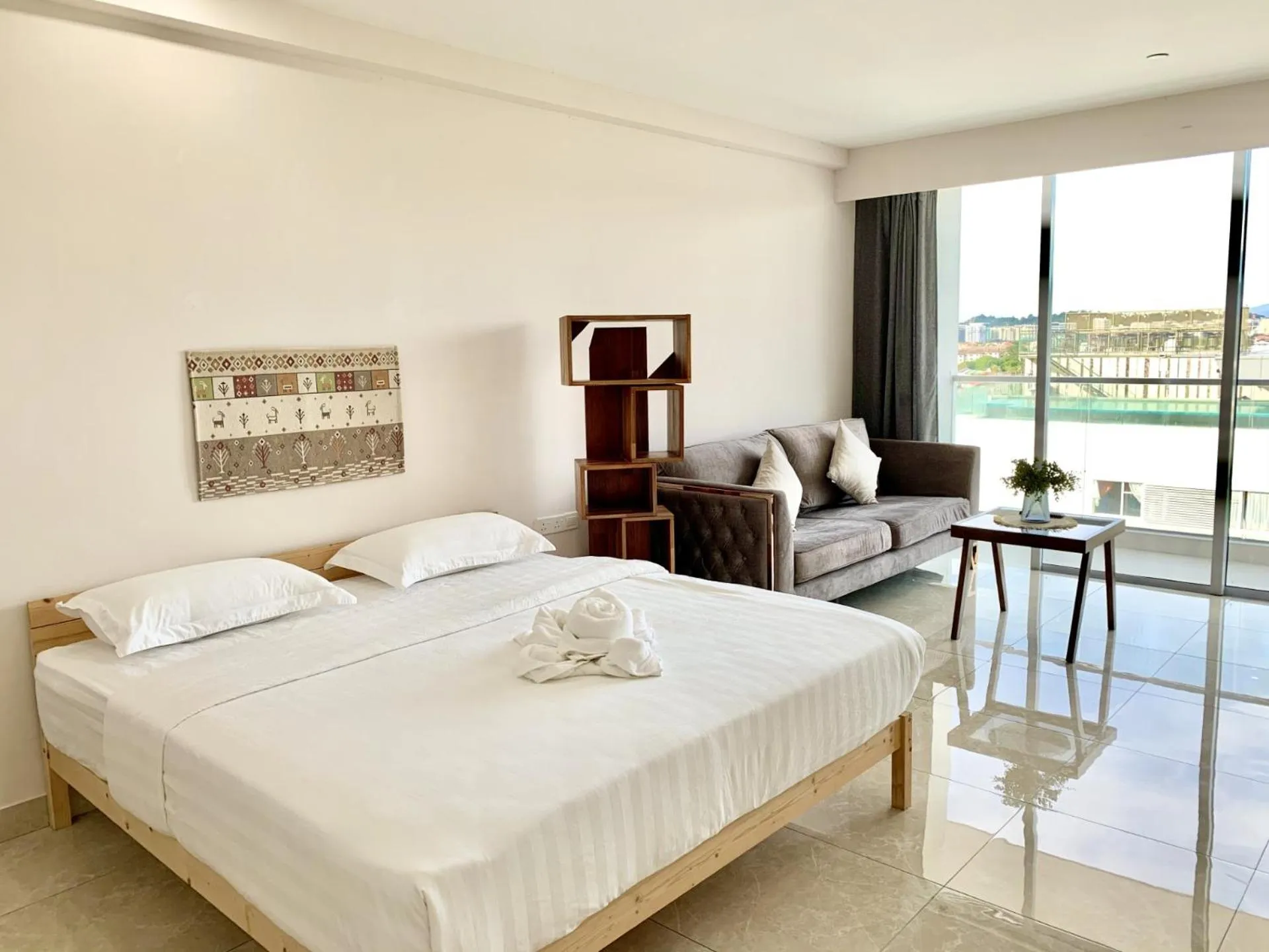 Living room, Bed in Deco Home @ Aru Suites