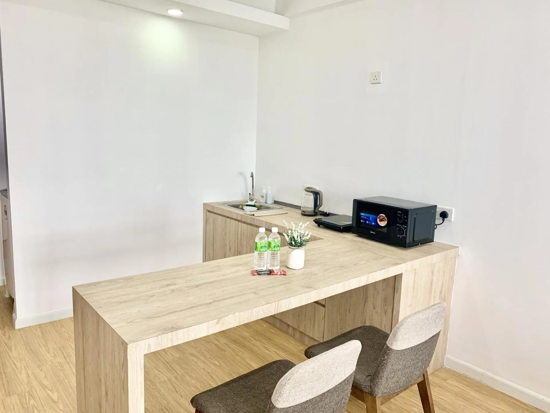 Kitchen or kitchenette in Deco Home @ Aru Suites