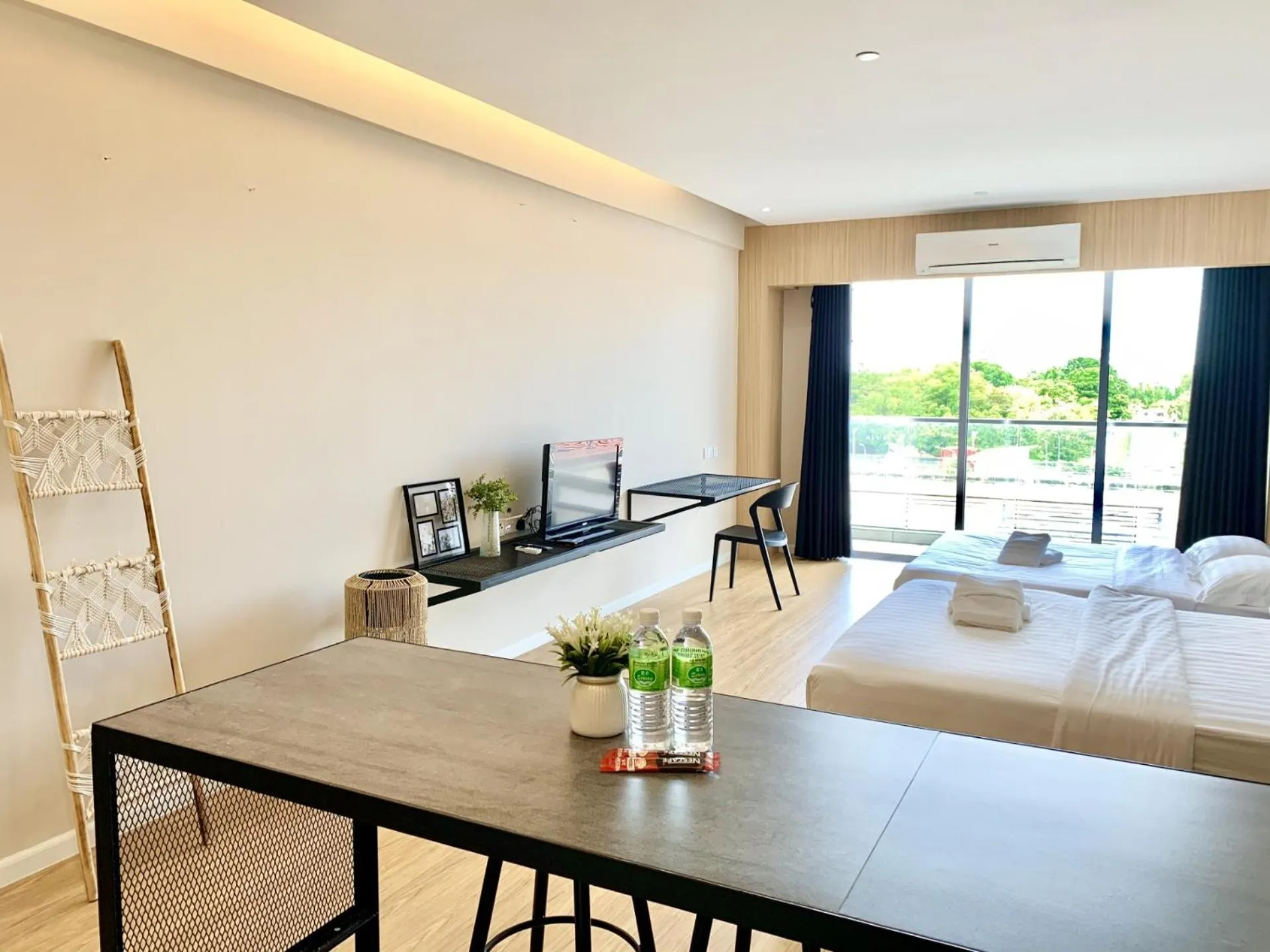 Living room, Bed in Deco Home @ Aru Suites